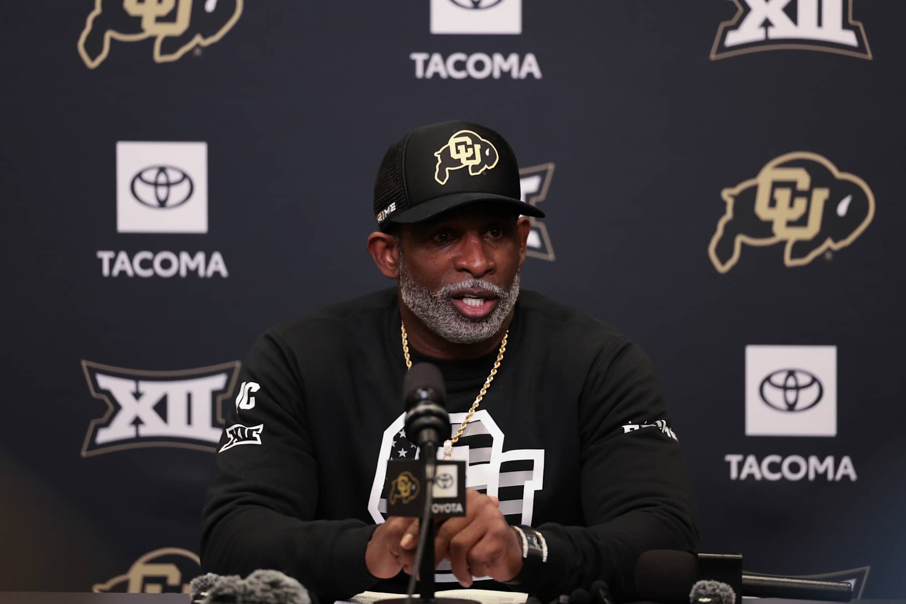 BOULDER, COLORADO - NOVEMBER 16: Head coach Deion Sanders of the Colorado Buffaloes talks to media during a press conference after defeating the Utah Utes at Folsom Field on November 16, 2024 in Boulder, Colorado. The Colorado Buffaloes defeated the Utah Utes 49-24. (Photo by Andrew Wevers/Getty Images)