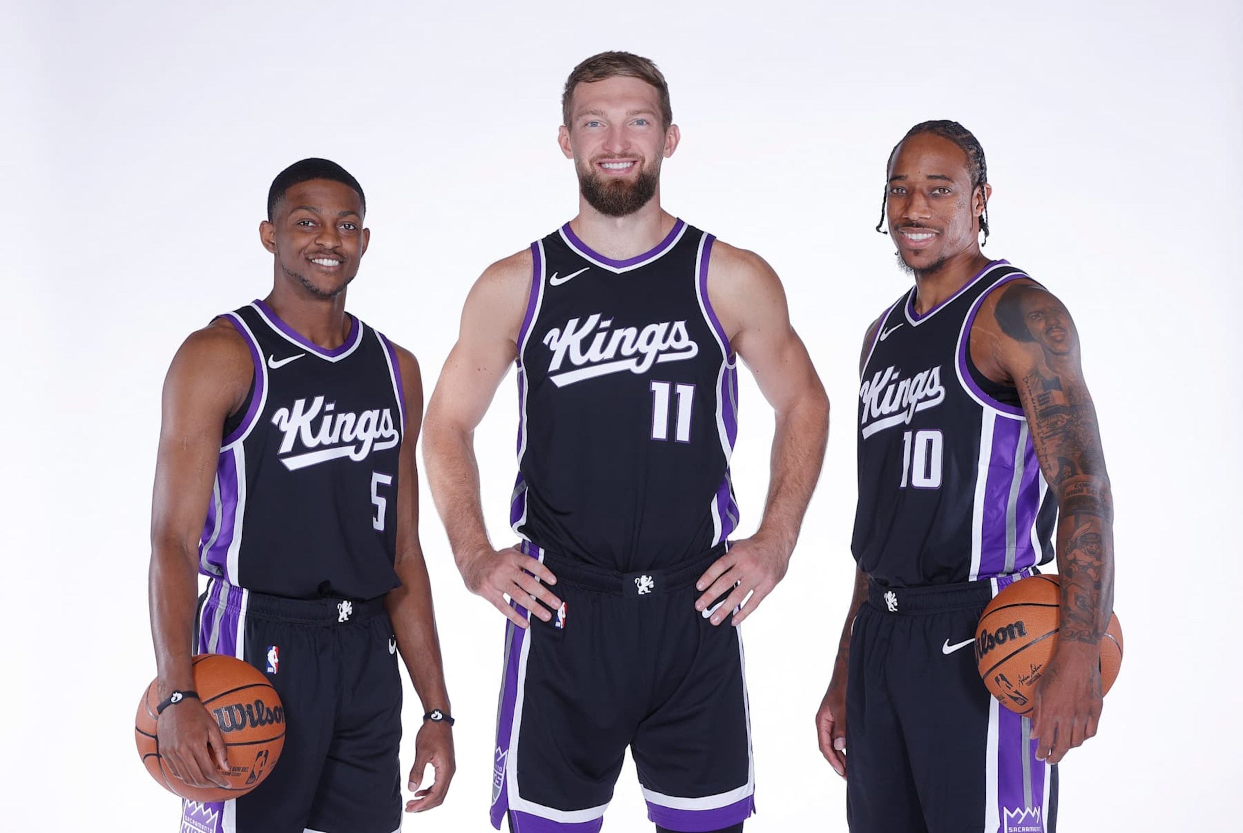 SACRAMENTO, CA - SEPTEMBER 30: De'Aaron Fox #5, Domantas Sabonis #11 and DeMar DeRozan #10 of the Sacramento Kings poses for a portrait during NBA Media Day on September 30, 2024 at the Golden 1 Center in Sacramento, California. NOTE TO USER: User expressly acknowledges and agrees that, by downloading and/or using this Photograph, user is consenting to the terms and conditions of the Getty Images License Agreement. Mandatory Copyright Notice: Copyright 2024 NBAE (Photo by Rocky Widner/NBAE via Getty Images) SACRAMENTO, CA - SEPTEMBER 30: De'Aaron Fox #5, Domantas Sabonis #11 and DeMar DeRozan #10 of the Sacramento Kings poses for a portrait during NBA Media Day on September 30, 2024 at the Golden 1 Center in Sacramento, California. NOTE TO USER: User expressly acknowledges and agrees that, by downloading and/or using this Photograph, user is consenting to the terms and conditions of the Getty Images License Agreement. Mandatory Copyright Notice: Copyright 2024 NBAE (Photo by Rocky Widner/NBAE via Getty Images)