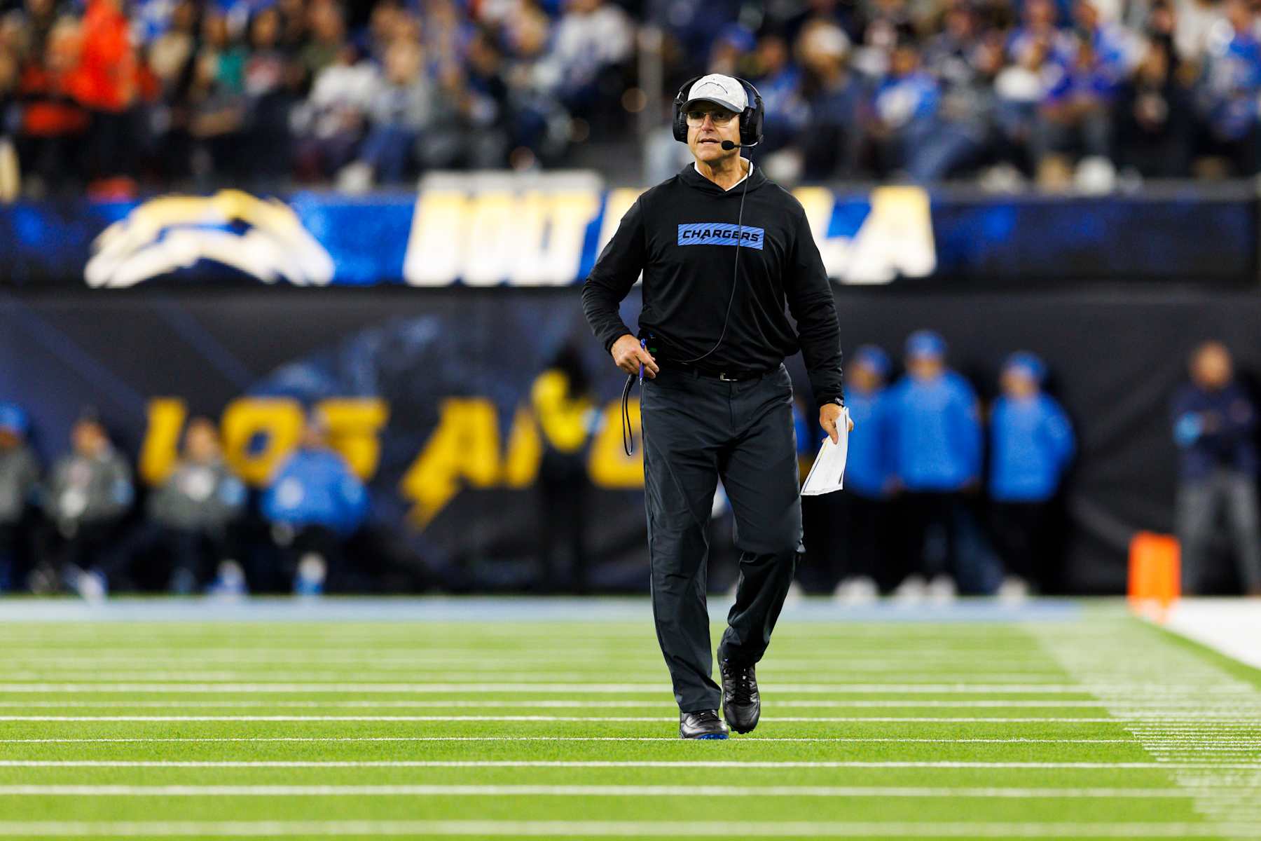 INGLEWOOD, CALIFORNIA - NOVEMBER 17: Jim Harbaugh of the Los Angeles Chargers on the field during the first half against the Cincinnati Bengals at SoFi Stadium on November 17, 2024 in Inglewood, California. (Photo by Ric Tapia/Getty Images)