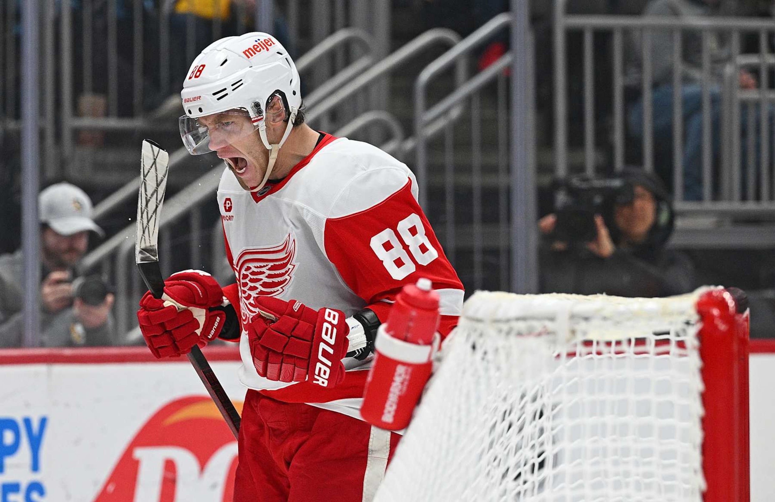 PITTSBURGH, PENNSYLVANIA - NOVEMBER 13: Patrick Kane #88 of the Detroit Red Wings reacts after scoring a goal in the second period against the Pittsburgh Penguins at PPG PAINTS Arena on November 13, 2024 in Pittsburgh, Pennsylvania. (Photo by Justin Berl/Getty Images)