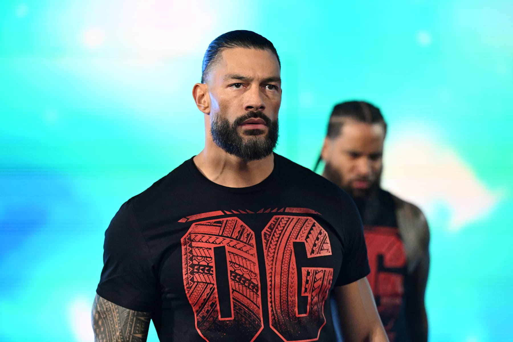 MILWAUKEE, WISCONSIN - NOVEMBER 15: Roman Reigns (L) and Jimmy Uso make their entrance during WWE SmackDown at Fiserv Forum on November 15, 2024 in Milwaukee, Wisconsin. (Photo by WWE/Getty Images)