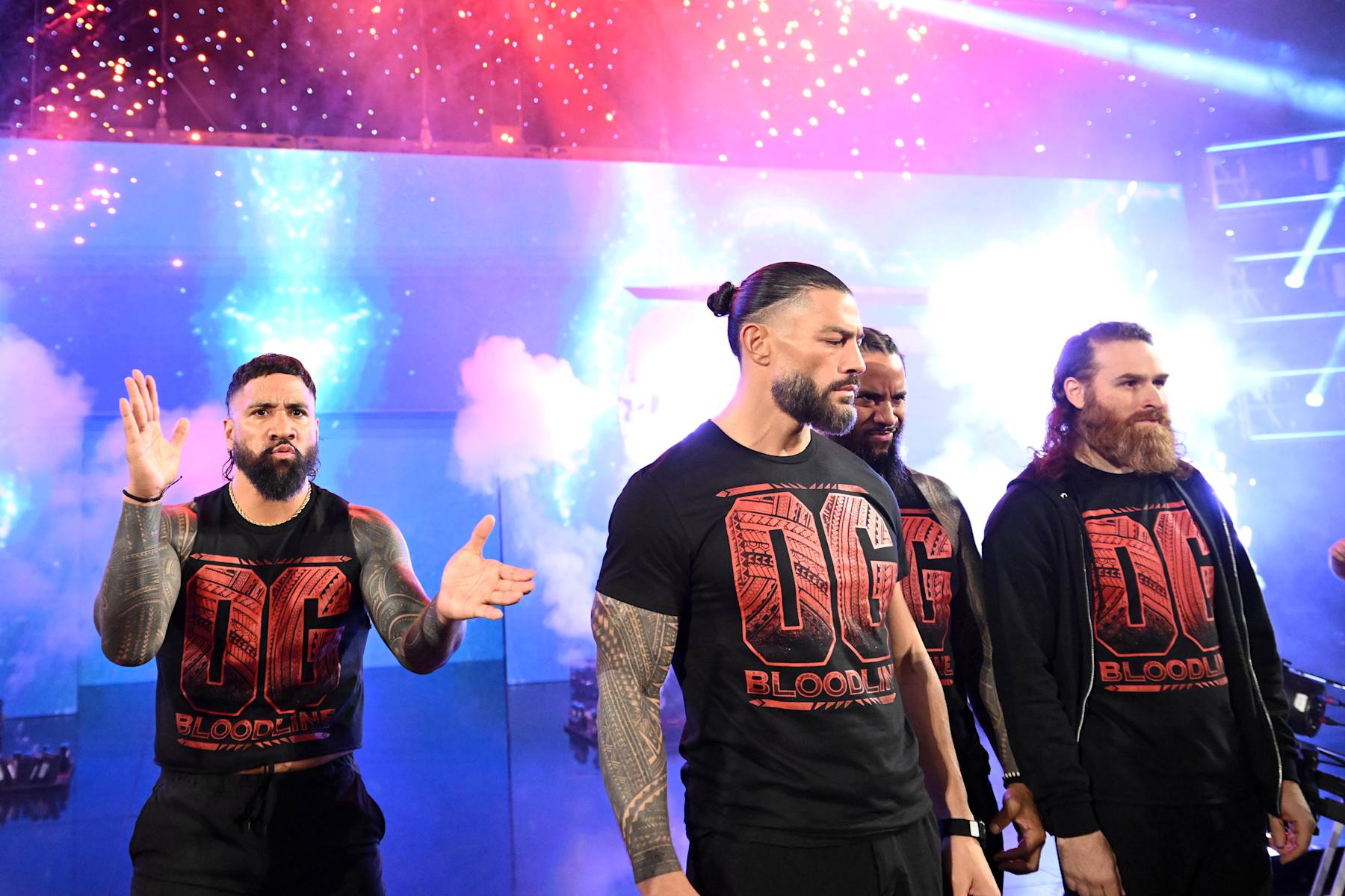MILWAUKEE, WISCONSIN - NOVEMBER 15: (L-R) Jey Uso, Roman Reigns, Jimmy Uso and Sami Zayn of the OG Bloodline make their entrance during WWE SmackDown at Fiserv Forum on November 15, 2024 in Milwaukee, Wisconsin. (Photo by WWE/Getty Images)