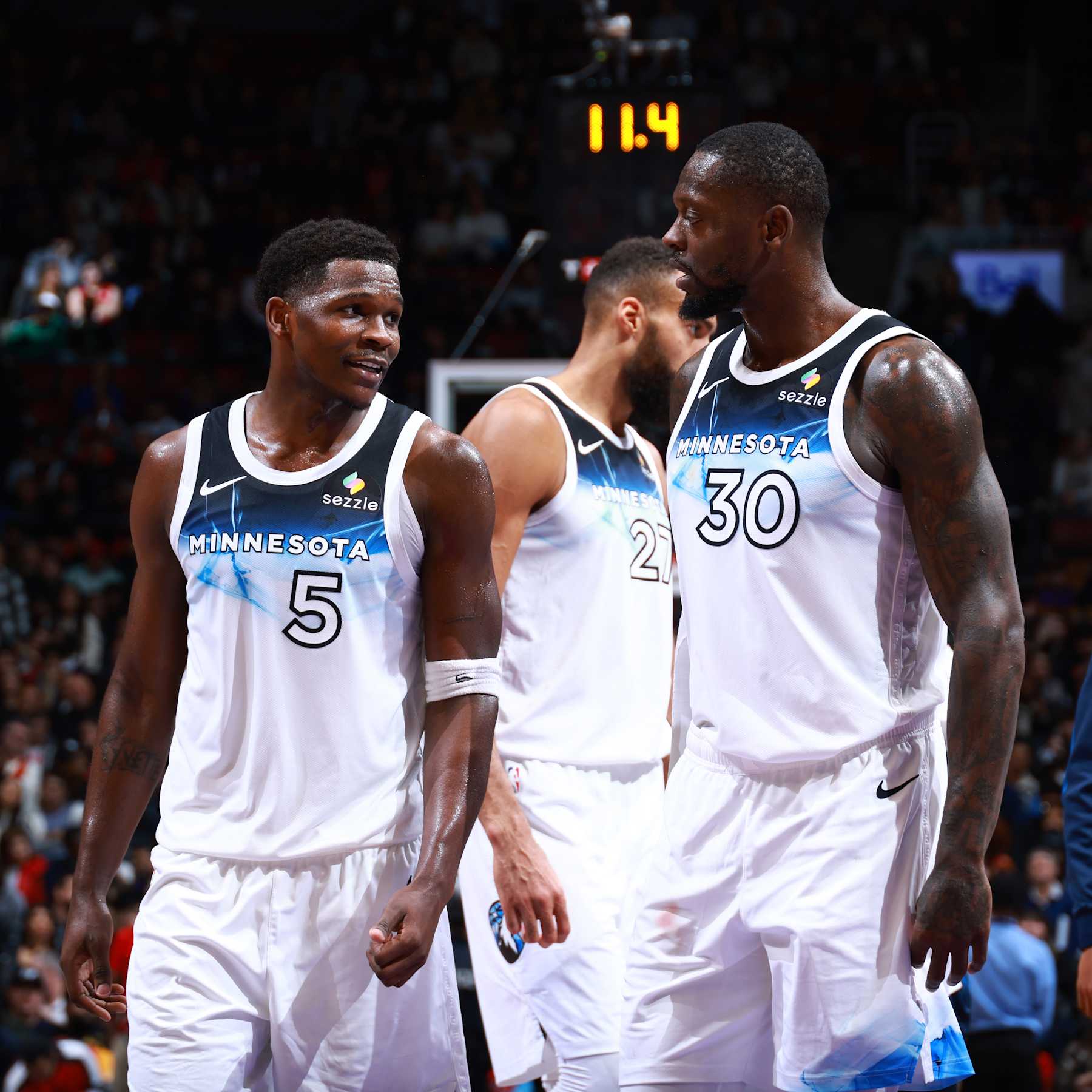 TORONTO, CANADA - NOVEMBER 21: Anthony Edwards #5 and Julius Randle #30 of the Minnesota Timberwolves talk during the game against the Toronto Raptors on November 21, 2024 at the Scotiabank Arena in Toronto, Ontario, Canada.  NOTE TO USER: User expressly acknowledges and agrees that, by downloading and or using this Photograph, user is consenting to the terms and conditions of the Getty Images License Agreement.  Mandatory Copyright Notice: Copyright 2024 NBAE (Photo by Vaughn Ridley/NBAE via Getty Images)