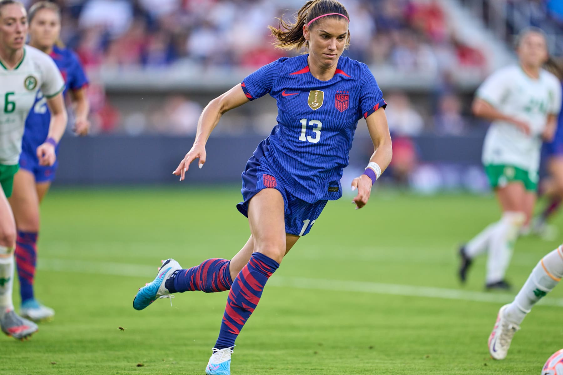 ST. LOUIS, MO - APRIL 11: Alex Morgan #13 of the USA races towards the goal during an international friendly game between Ireland and United States at CITYPARK on April 11, 2023 in St. Louis, Missouri. (Photo by Robin Alam/ISI Photos/Getty Images).