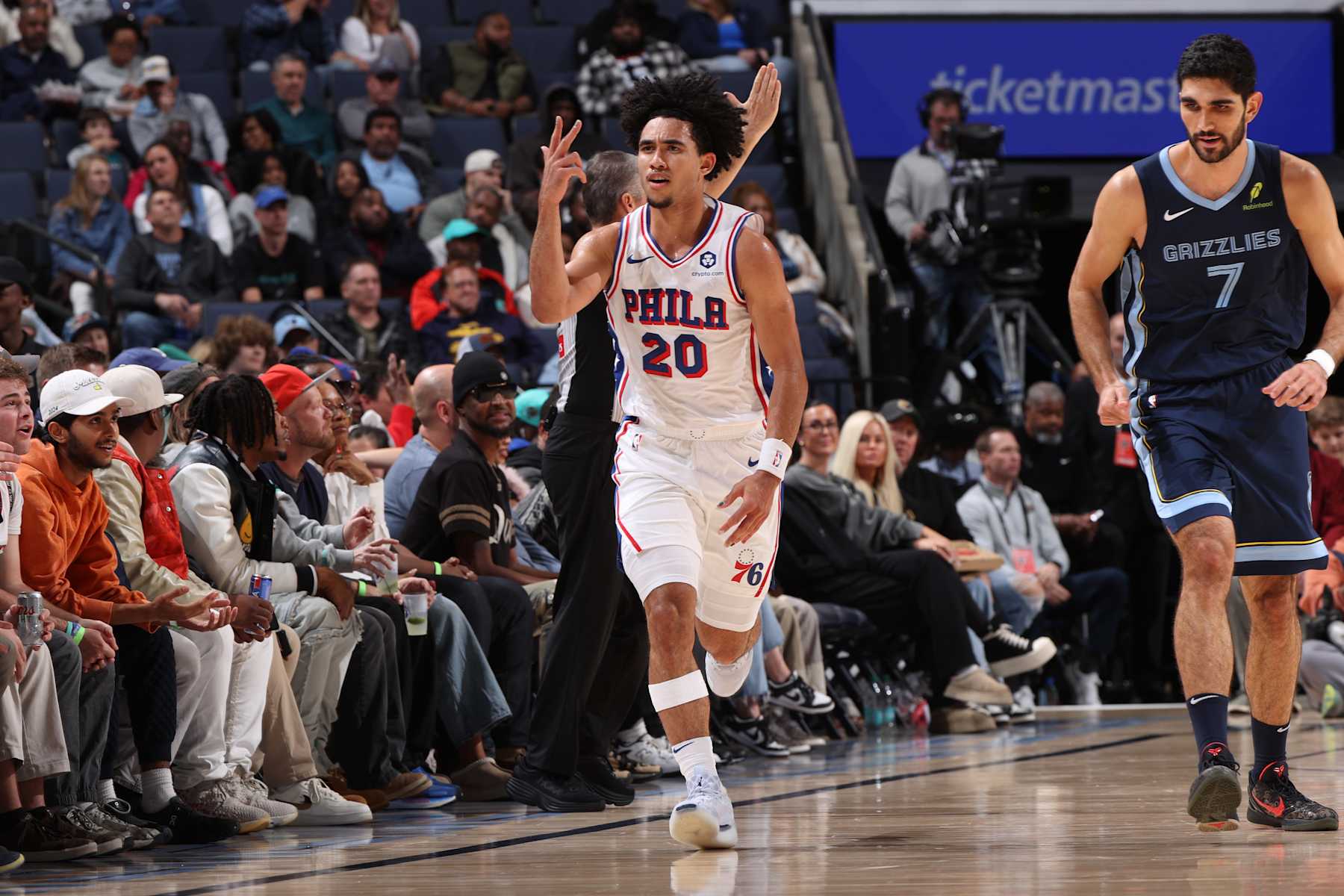 MEMPHIS, TN - NOVEMBER 22: Jared McCain #20 of the Philadelphia 76ers celebrates during the game against the Memphis Grizzlies on November 22, 2024 at FedExForum in Memphis, Tennessee. NOTE TO USER: User expressly acknowledges and agrees that, by downloading and or using this photograph, User is consenting to the terms and conditions of the Getty Images License Agreement. Mandatory Copyright Notice: Copyright 2024 NBAE (Photo by Joe Murphy/NBAE via Getty Images)