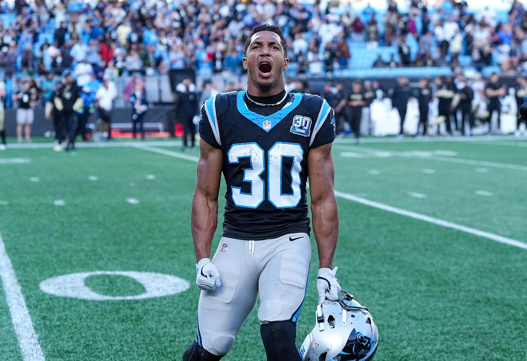 CHARLOTTE, NORTH CAROLINA - NOVEMBER 03: Chuba Hubbard #30 of the Carolina Panthers celebrates after a win over the against the New Orleans Saints at Bank of America Stadium on November 03, 2024 in Charlotte, North Carolina. (Photo by Matt Kelley/Getty Images)