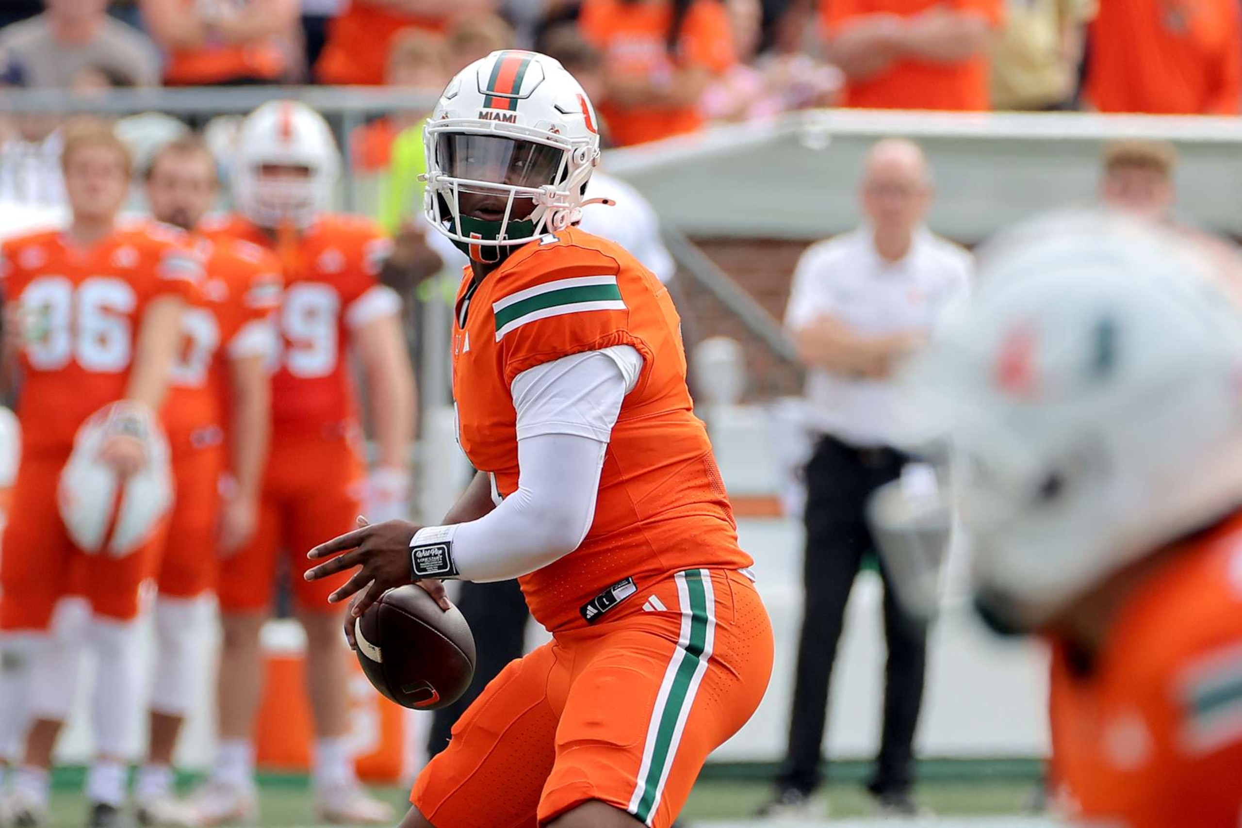 ATLANTA, GA - NOVEMBER 09: Miami Hurricanes starting quarterback Cam Ward #1 prepares to pass during the Saturday afternoon college football game between the Miami Hurricanes and the Georgia Tech Yellow Jackets on November 9, 2024 at Bobby Dodd Stadium in Atlanta, GA.  (Photo by David J. Griffin/Icon Sportswire via Getty Images)