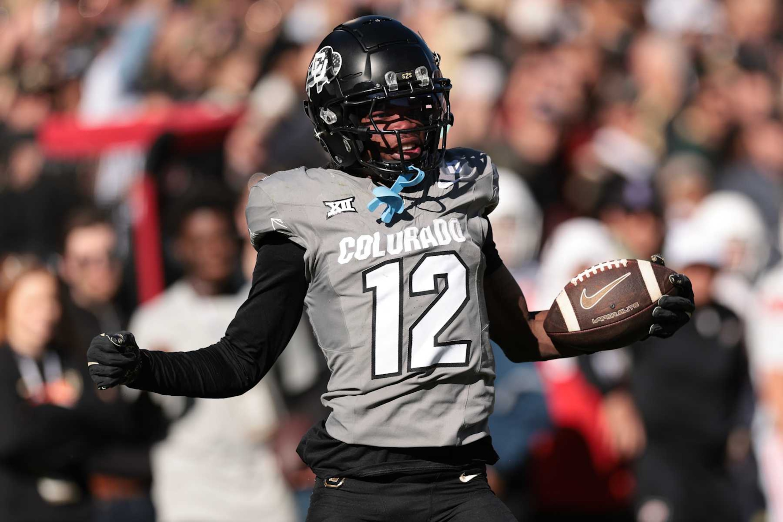 BOULDER, COLORADO - NOVEMBER 16: Travis Hunter #12 of Colorado Buffaloes celebrates catching a pass during the second quarter against the Utah Utes at Folsom Field on November 16, 2024 in Boulder, Colorado. (Photo by Andrew Wevers/Getty Images)