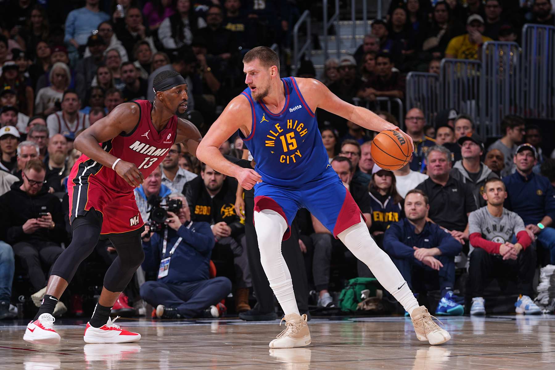 DENVER, CO - NOVEMBER 8: Nikola Jokic #15 of the Denver Nuggets dribbles the ball during the game against the Miami Heat on November 8, 2024 at Ball Arena in Denver, Colorado. NOTE TO USER: User expressly acknowledges and agrees that, by downloading and/or using this Photograph, user is consenting to the terms and conditions of the Getty Images License Agreement. Mandatory Copyright Notice: Copyright 2024 NBAE (Photo by Bart Young/NBAE via Getty Images)