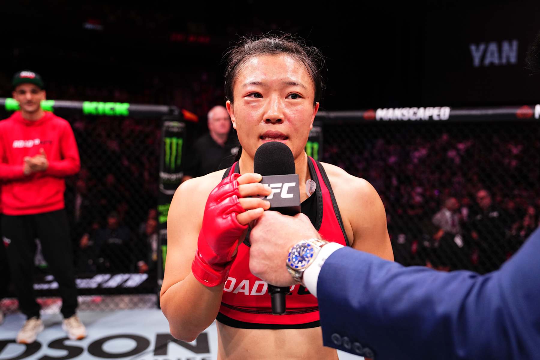 MACAU, CHINA - NOVEMBER 23: Shi Ming of China is interviewed after her victory over Feng Xiaocan of China in their Women’s Strawweight RTU Tournament Final fight during the UFC Fight Night event at Galaxy Arena on November 23, 2024 in Macau, China. (Photo by Jeff Bottari/Zuffa LLC)