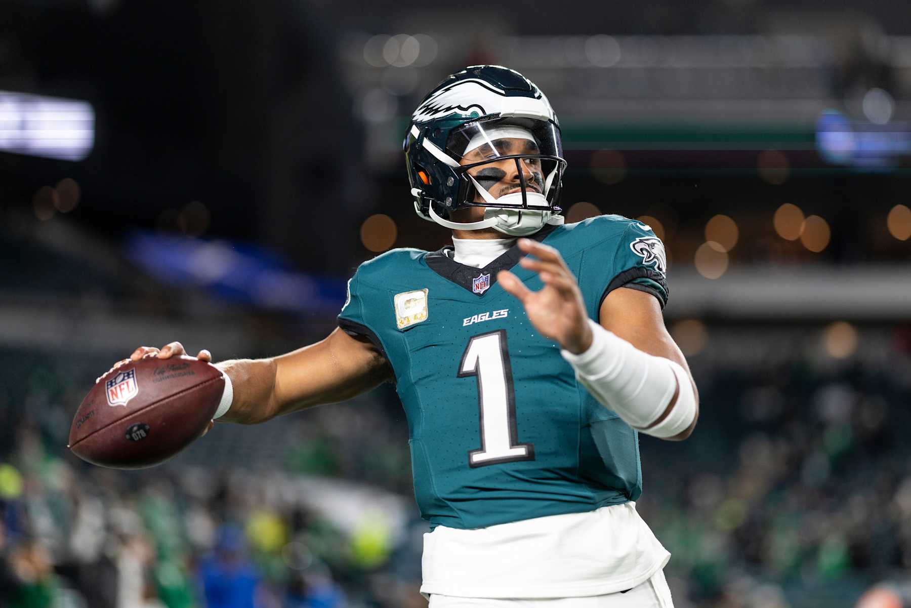 PHILADELPHIA, PENNSYLVANIA - NOVEMBER 14: Jalen Hurts #1 of the Philadelphia Eagles looks to pass prior to an NFL Football game against the Washington Commanders at Lincoln Financial Field on November 14, 2024 in Philadelphia, Pennsylvania. (Photo by Michael Owens/Getty Images)