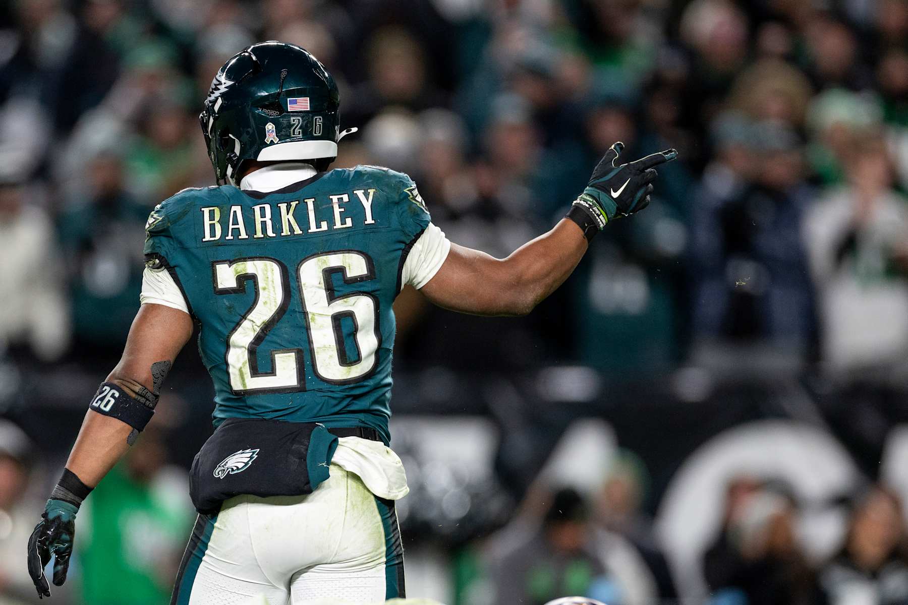 PHILADELPHIA, PENNSYLVANIA - NOVEMBER 14: Saquon Barkley #26 of the Philadelphia Eagles reacts after running with the ball during an NFL Football game against the Washington Commanders at Lincoln Financial Field on November 14, 2024 in Philadelphia, Pennsylvania. (Photo by Michael Owens/Getty Images)