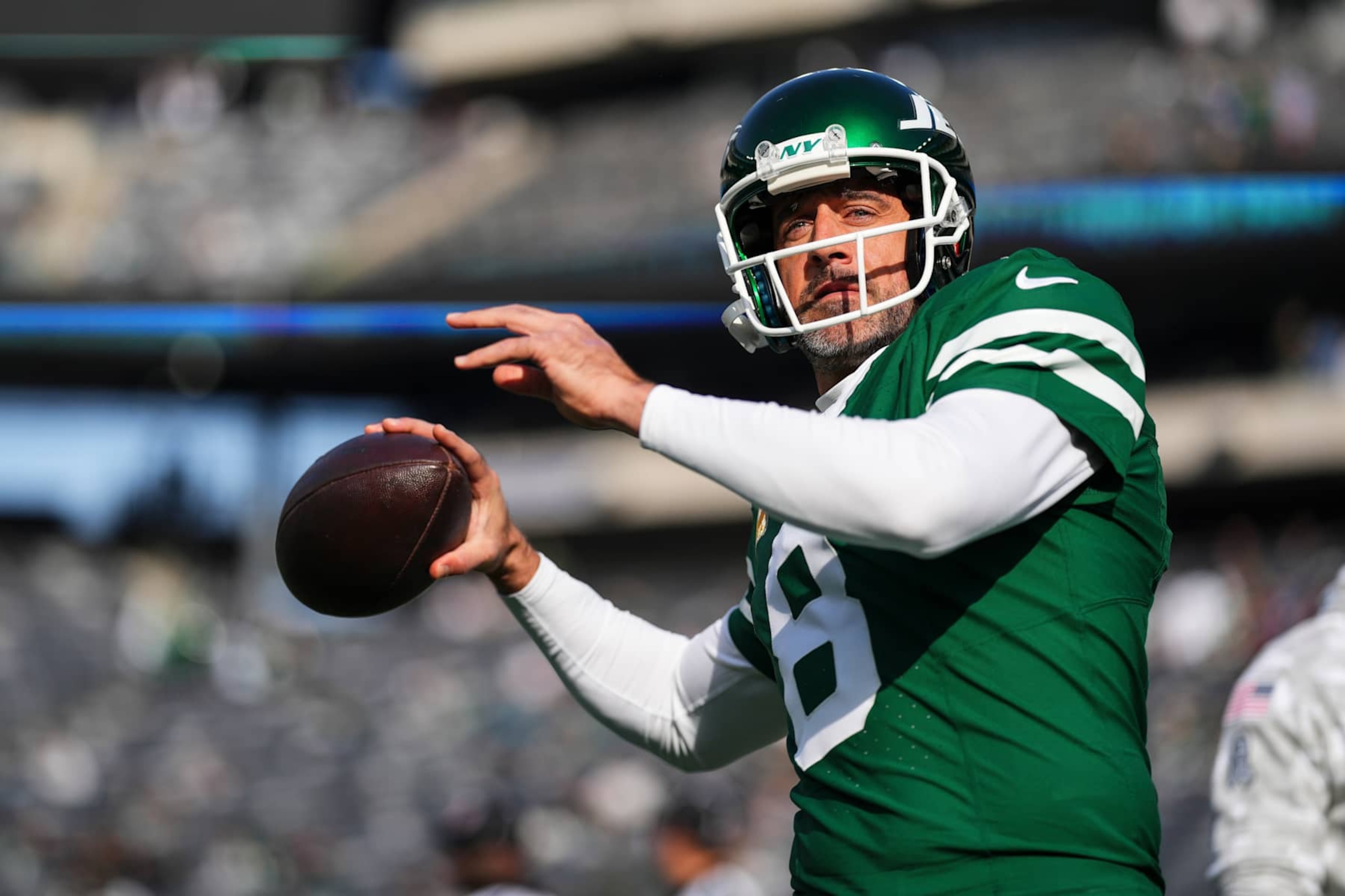 EAST RUTHERFORD, NJ - NOVEMBER 17: Aaron Rodgers #8 of the New York Jets warms up prior to an NFL football game against the Indianapolis Colts at MetLife Stadium on November 17, 2024 in East Rutherford, New Jersey. (Photo by Cooper Neill/Getty Images)