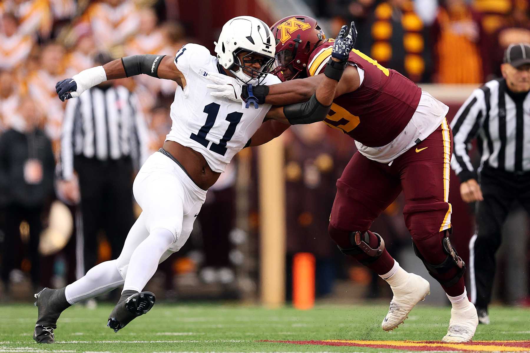 MINNEAPOLIS, MINNESOTA - NOVEMBER 23: Abdul Carter #11 of the Penn State Nittany Lions competes against Aireontae Ersery #69 of the Minnesota Golden Gophers in the first quarter at Huntington Bank Stadium on November 23, 2024 in Minneapolis, Minnesota. (Photo by David Berding/Getty Images)