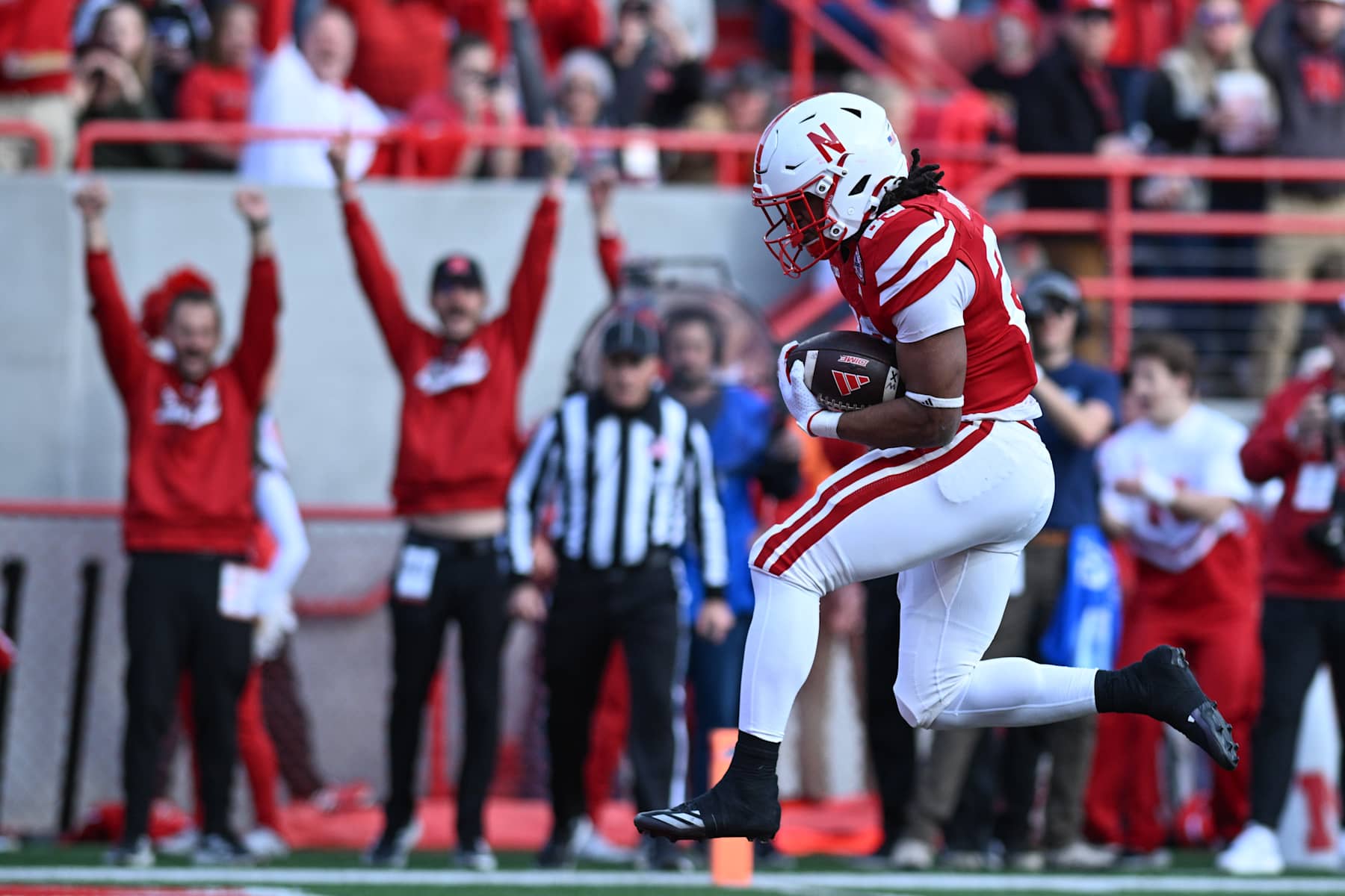 LINCOLN, NEBRASKA - NOVEMBER 23: Dante Dowdell #23 of the Nebraska Cornhuskers scores against the Wisconsin Badgers during the second quarter at Memorial Stadium on November 23, 2024 in Lincoln, Nebraska.  (Photo by Steven Branscombe/Getty Images)