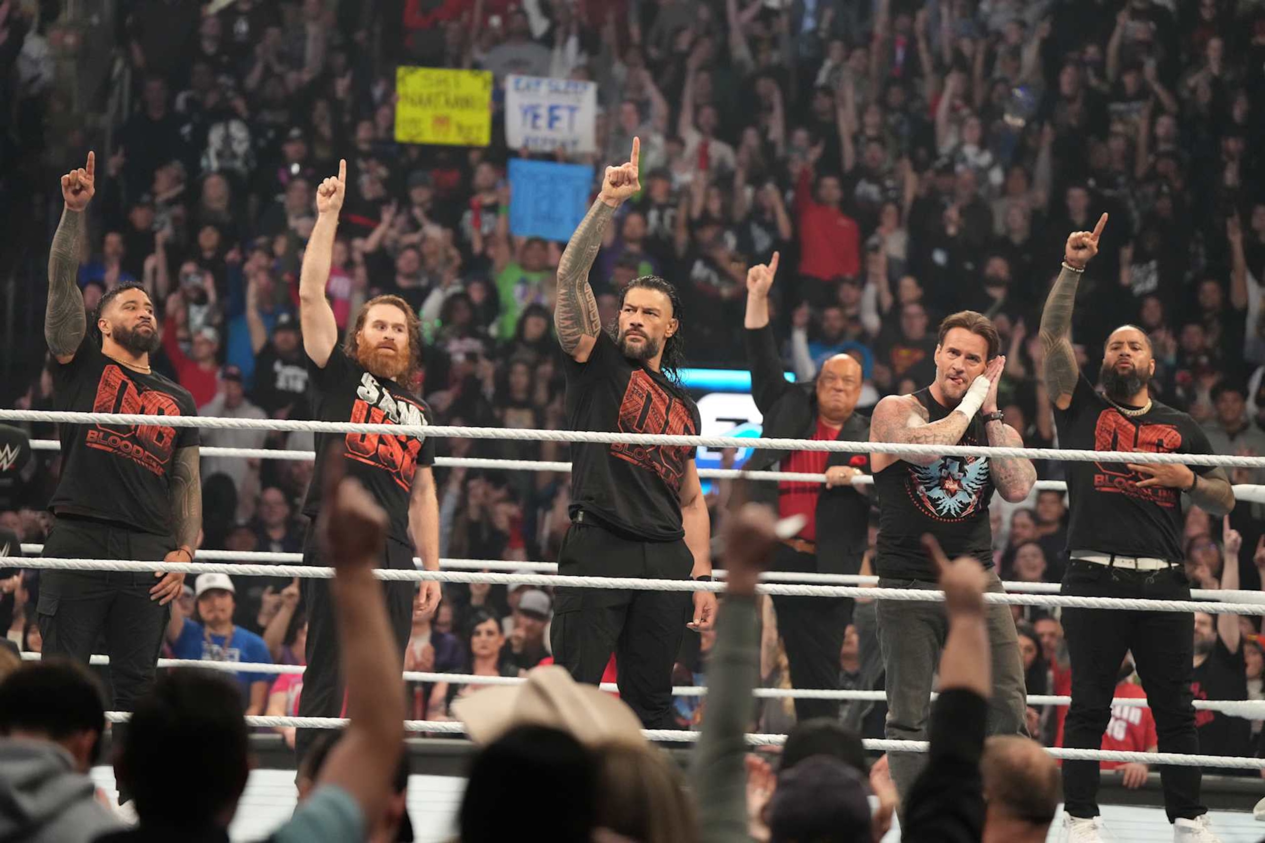 SALT LAKE CITY, UTAH - NOVEMBER 22: Jey Uso, Sami Zayn, Roman Reigns, CM Punk and Jimmy Uso posing during WWE SmackDown at Delta Center on November 22, 2024 in Salt Lake City, Utah.  (Photo by WWE/Getty Images)