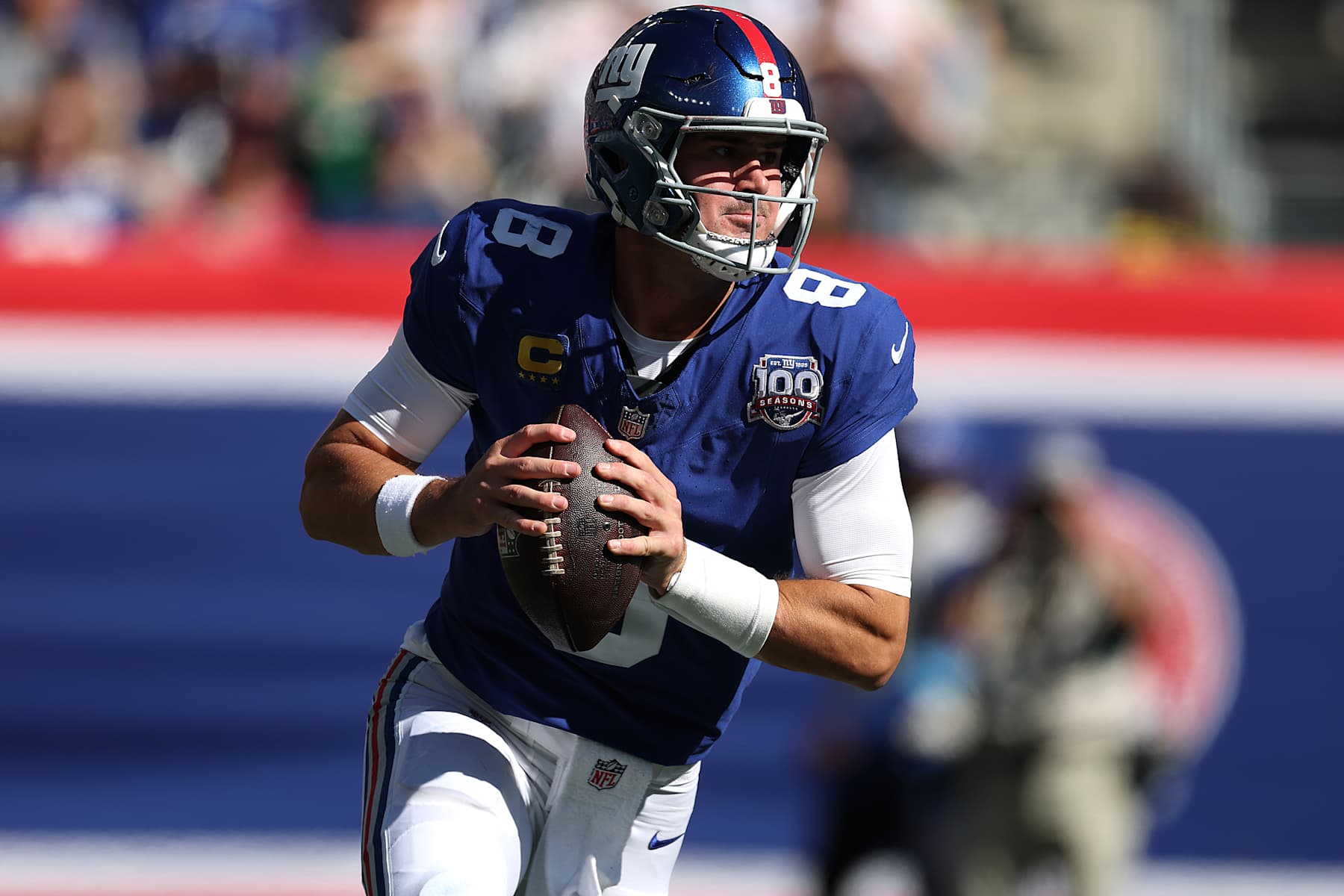 EAST RUTHERFORD, NEW JERSEY - OCTOBER 20: Daniel Jones #8 of the New York Giants looks to pass against the Philadelphia Eagles during the first half at MetLife Stadium on October 20, 2024 in East Rutherford, New Jersey. (Photo by Al Bello/Getty Images)