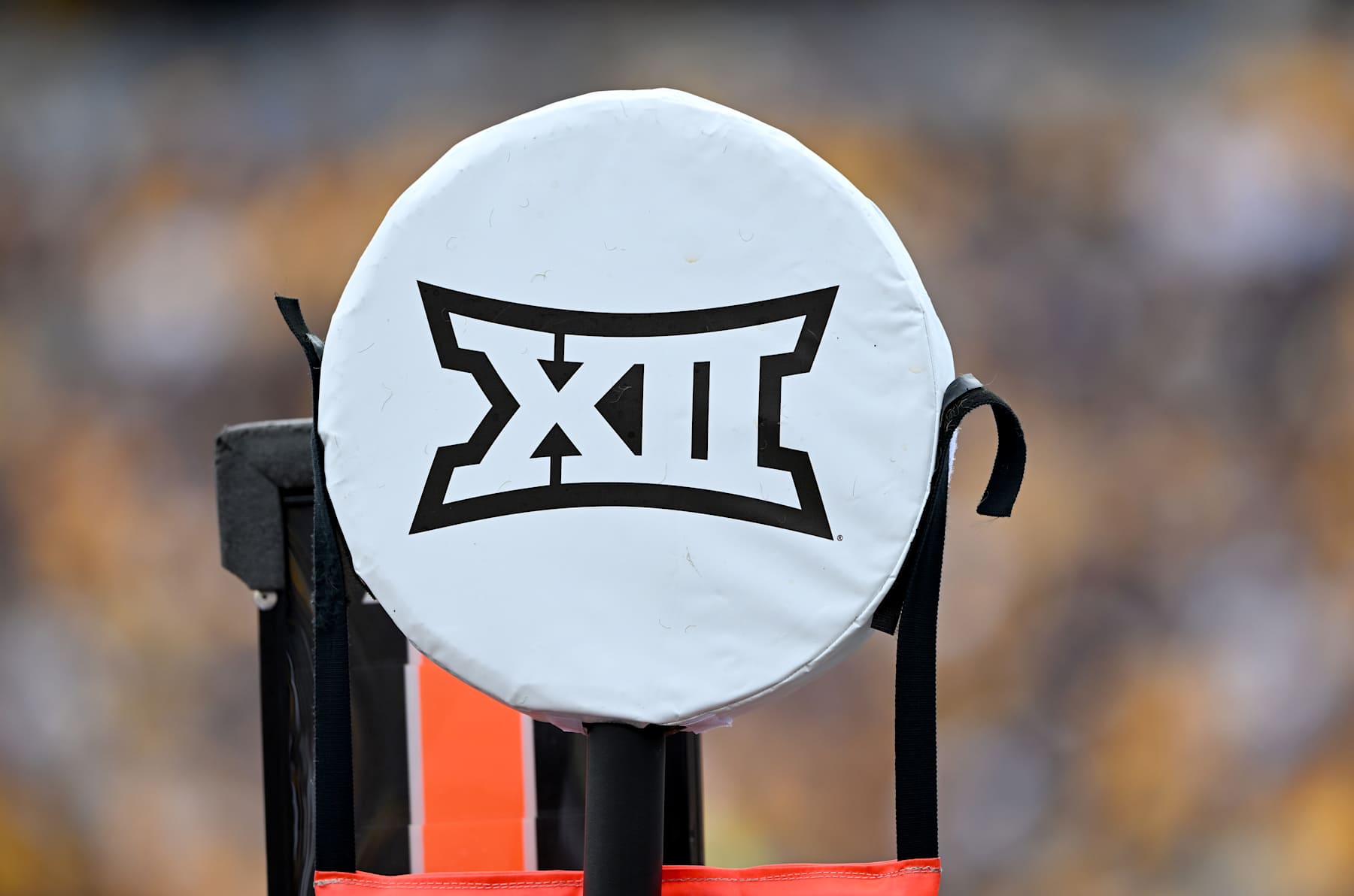 MORGANTOWN, WEST VIRGINIA - SEPTEMBER 21: A view of the Big 12 logo on a yardage marker during the game between the West Virginia Mountaineers and the Kansas Jayhawks against the at Milan Puskar Stadium on September 21, 2024 in Morgantown, West Virginia. (Photo by G Fiume/Getty Images)
