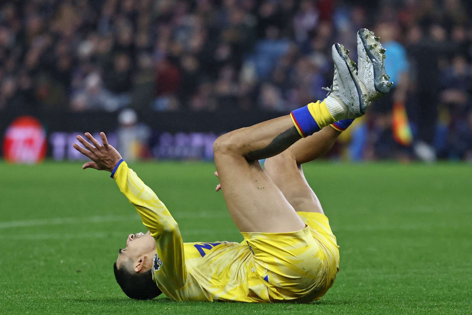 Crystal Palace's Colombian defender #12 Daniel Munoz reacts after missing a chance during the English Premier League football match between Aston Villa and Crystal Palace at Villa Park in Birmingham, central England on November 23, 2024. (Photo by Darren Staples / AFP) / RESTRICTED TO EDITORIAL USE. No use with unauthorized audio, video, data, fixture lists, club/league logos or 'live' services. Online in-match use limited to 120 images. An additional 40 images may be used in extra time. No video emulation. Social media in-match use limited to 120 images. An additional 40 images may be used in extra time. No use in betting publications, games or single club/league/player publications. / (Photo by DARREN STAPLES/AFP via Getty Images)