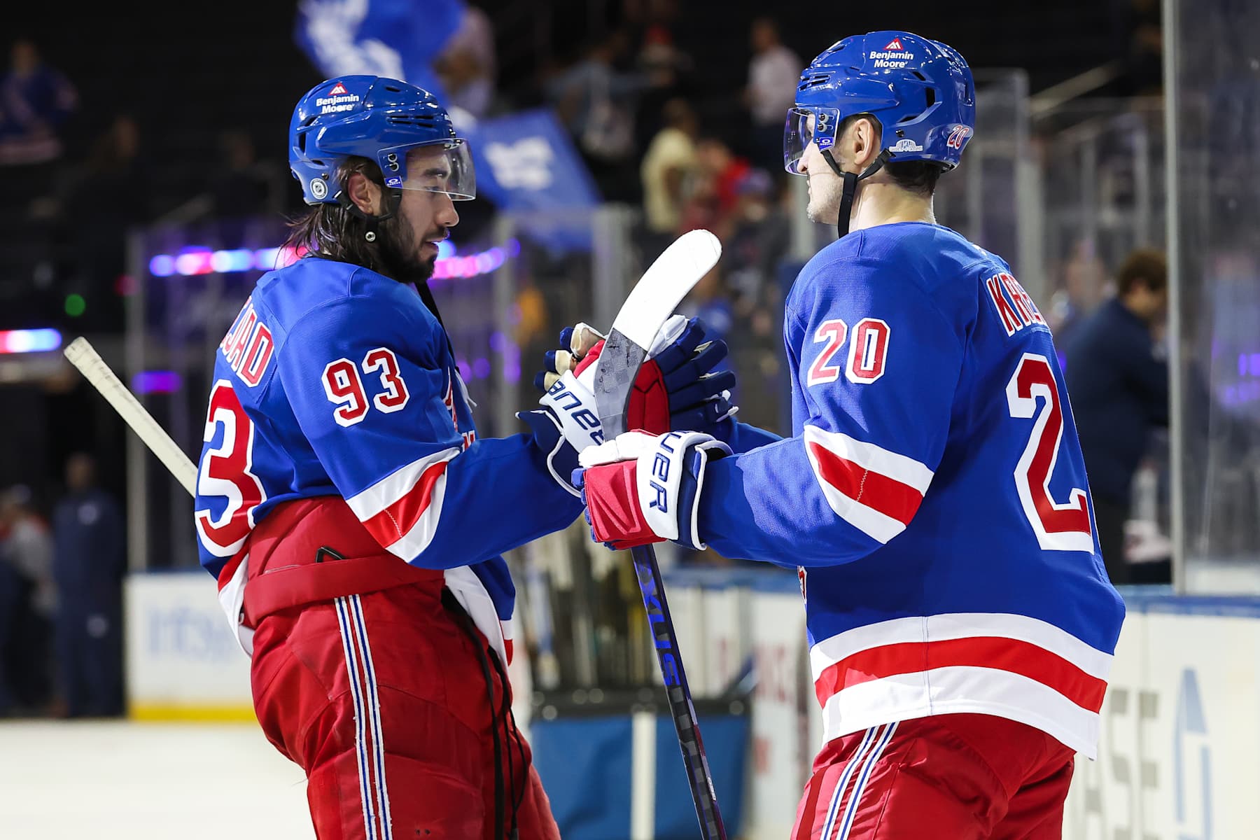 NEW YORK, NEW YORK - SEPTEMBER 26: Mika Zibanejad #93 of the New York Rangers and Chris Kreider #20 of the New York Rangers celebrate after the third period of a preseason game against the Boston Bruins at Madison Square Garden on September 26, 2024 in New York City. (Photo by Andrew Mordzynski/Getty Images)