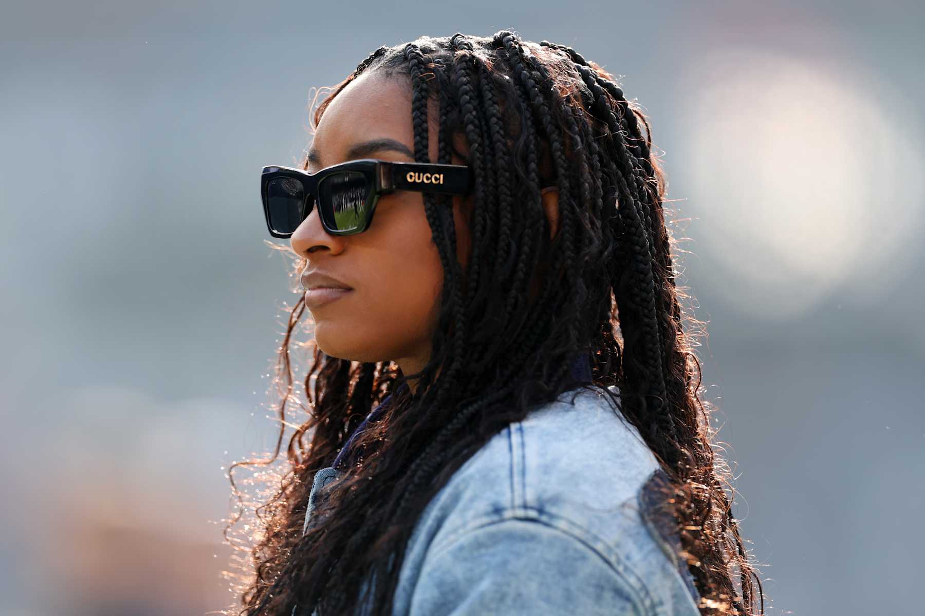 CHICAGO, ILLINOIS - NOVEMBER 24: Simone Biles looks on prior to a game between the Chicago Bears and the \m at Soldier Field on November 24, 2024 in Chicago, Illinois. (Photo by Luke Hales/Getty Images)