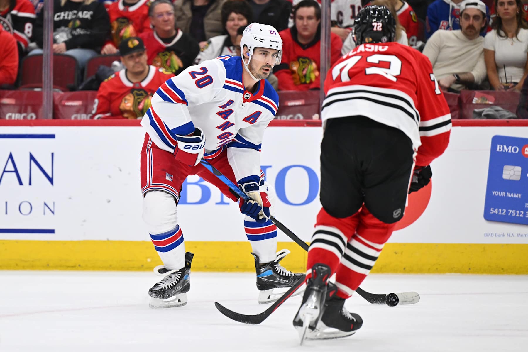 CHICAGO, ILLINOIS - FEBRUARY 09: Chris Kreider #20 of the New York Rangers controls the puck in the first period against the Chicago Blackhawks on February 09, 2024 at United Center in Chicago, Illinois. (Photo by Jamie Sabau/Getty Images)