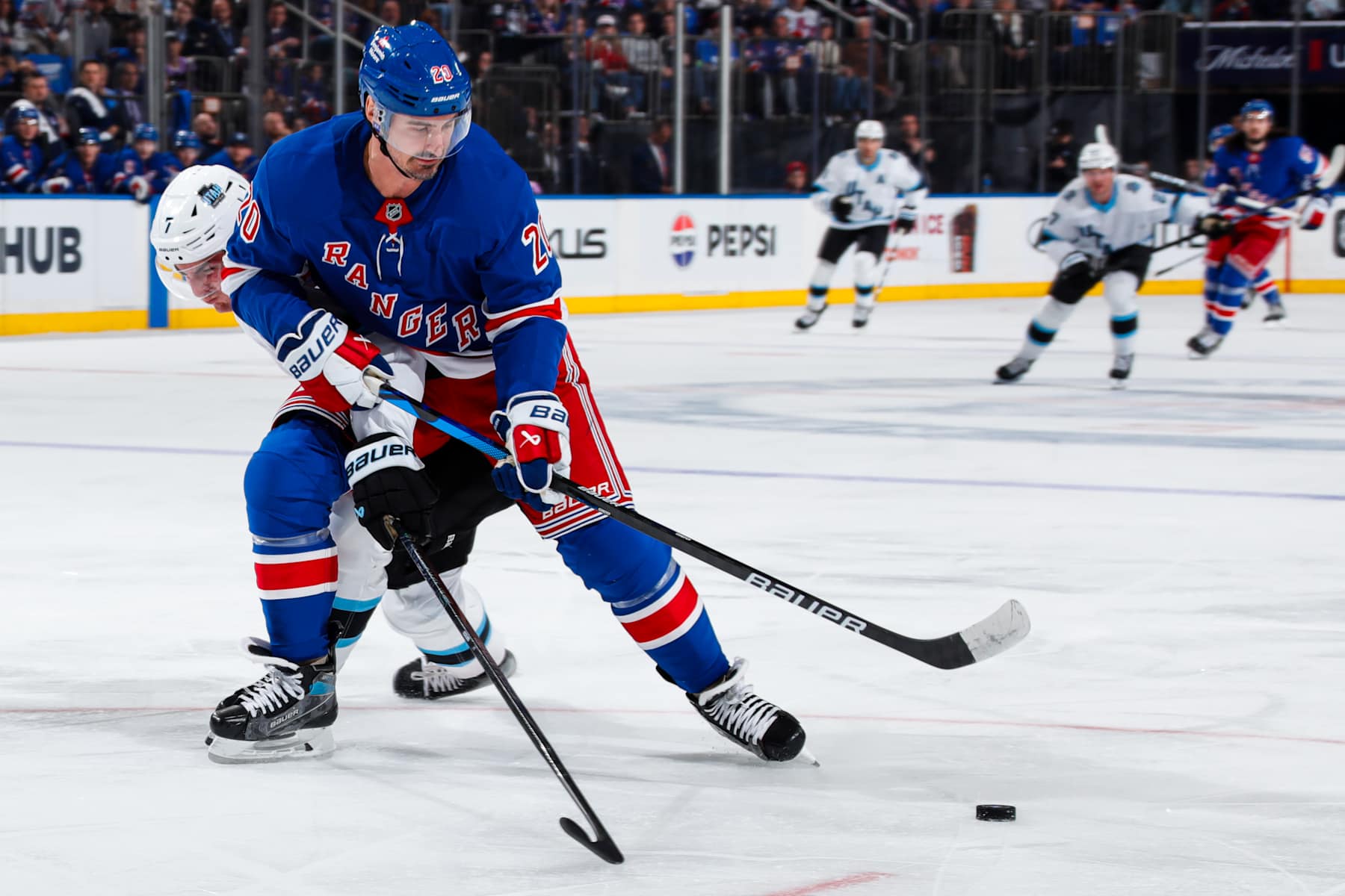 NEW YORK, NEW YORK - OCTOBER 12:  Chris Kreider #20 of the New York Rangers skates with the puck against the Utah Hockey Club at Madison Square Garden on October 12, 2024 in New York City. (Photo by Jared Silber/NHLI via Getty Images)