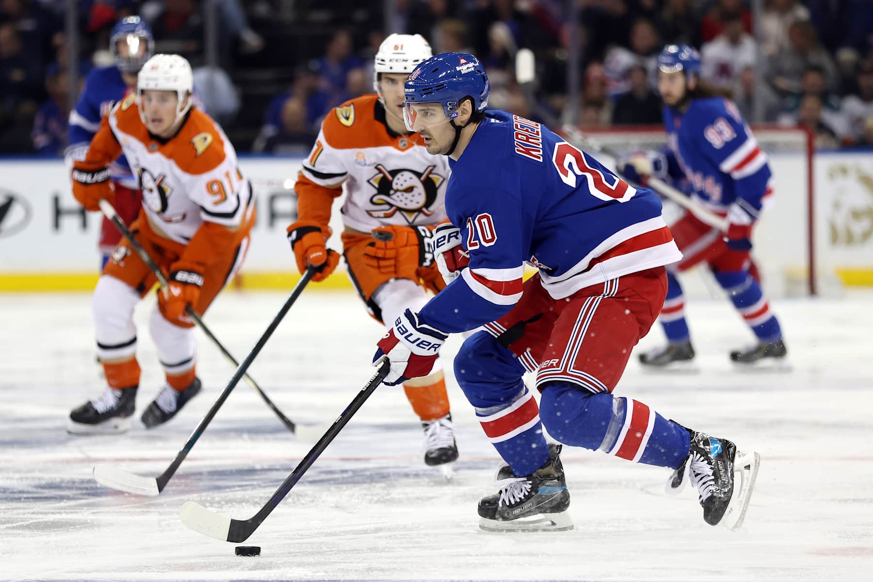 NEW YORK, NEW YORK - OCTOBER 26: Chris Kreider #20 of the New York Rangers controls the puck as Cutter Gauthier #61 of the Anaheim Ducks defends during the second period at Madison Square Garden on October 26, 2024 in New York City. (Photo by Sarah Stier/Getty Images)