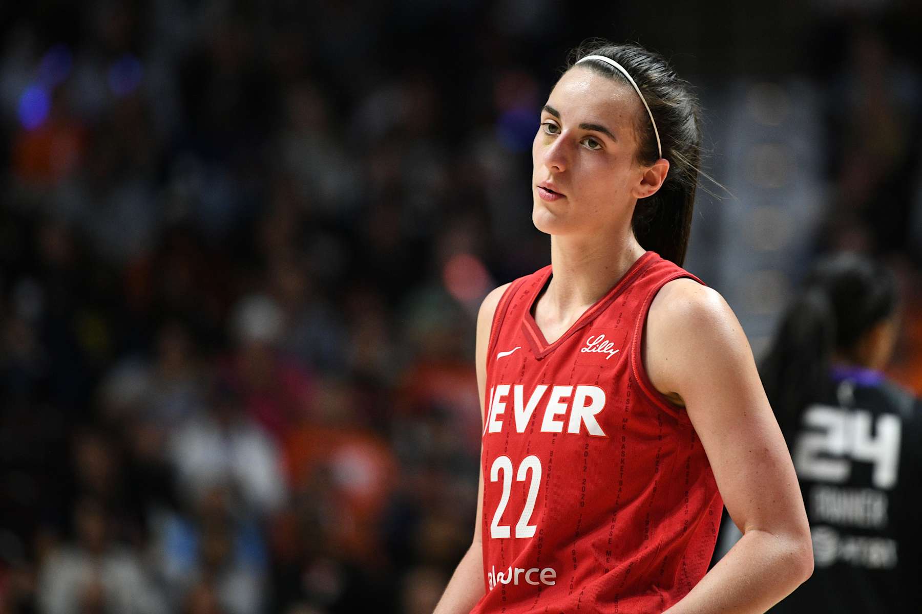 UNCASVILLE, CT - SEPTEMBER 25: Indiana Fever guard Caitlin Clark (22) looks on during game 2 of the first round of the WNBA Playoffs between the Indiana Fever and the Connecticut Sun on September 25, 2024, at Mohegan Sun Arena in Uncasville, CT. (Photo by Erica Denhoff/Icon Sportswire via Getty Images)