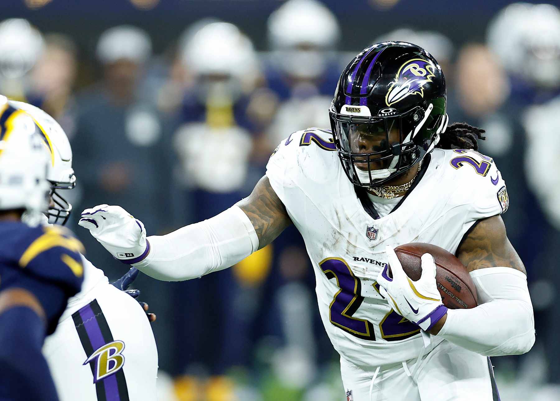 INGLEWOOD, CALIFORNIA - NOVEMBER 25:  Derrick Henry #22 of the Baltimore Ravens runs with the ball against the Los Angeles Chargers during the fourth quarter in the game at SoFi Stadium on November 25, 2024 in Inglewood, California.  (Photo by Ronald Martinez/Getty Images)
