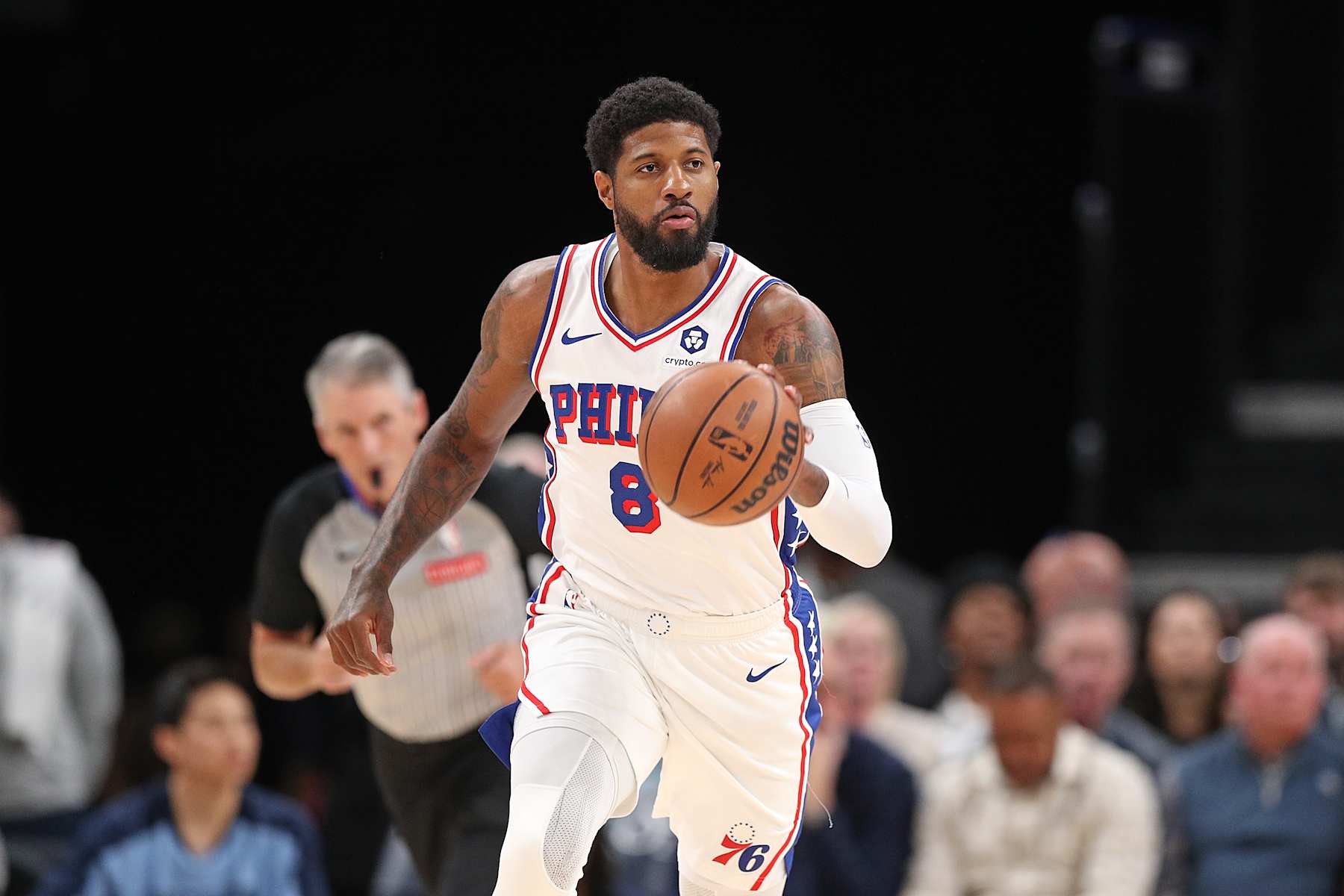 MEMPHIS, TENNESSEE - NOVEMBER 20: Paul George #8 of the Philadelphia 76ers brings the ball up court during the game against the Memphis Grizzlies at FedExForum on November 20, 2024 in Memphis, Tennessee. NOTE TO USER: User expressly acknowledges and agrees that, by downloading and or using this photograph, User is consenting to the terms and conditions of the Getty Images License Agreement. (Photo by Justin Ford/Getty Images)