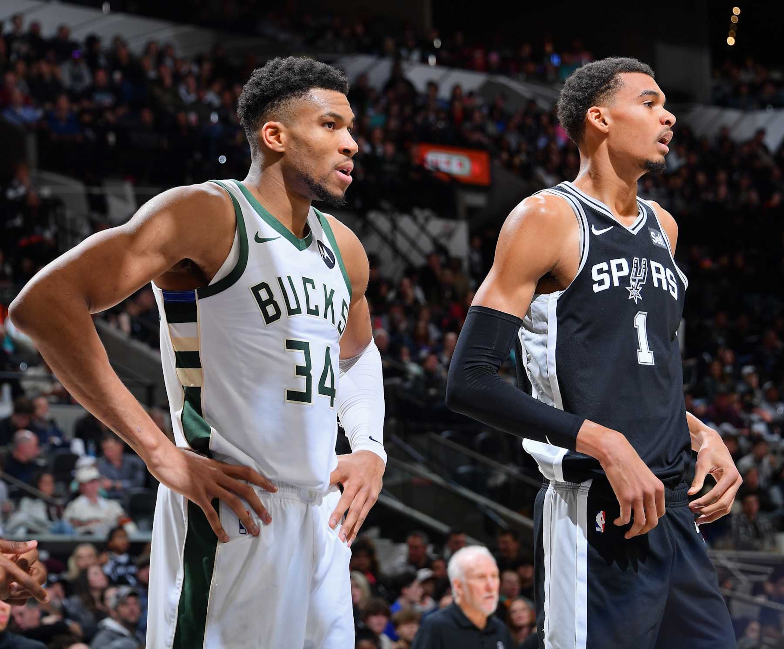 SAN ANTONIO, TX - JANUARY 4: Giannis Antetokounmpo #34 of the Milwaukee Bucks and Victor Wembanyama #1 of the San Antonio Spurs look on during the game on January 4, 2024 at the Frost Bank Center in San Antonio, Texas. NOTE TO USER: User expressly acknowledges and agrees that, by downloading and or using this photograph, user is consenting to the terms and conditions of the Getty Images License Agreement. Mandatory Copyright Notice: Copyright 2024 NBAE (Photos by Michael Gonzales/NBAE via Getty Images) SAN ANTONIO, TX - JANUARY 4: Giannis Antetokounmpo #34 of the Milwaukee Bucks and Victor Wembanyama #1 of the San Antonio Spurs look on during the game on January 4, 2024 at the Frost Bank Center in San Antonio, Texas. NOTE TO USER: User expressly acknowledges and agrees that, by downloading and or using this photograph, user is consenting to the terms and conditions of the Getty Images License Agreement. Mandatory Copyright Notice: Copyright 2024 NBAE (Photos by Michael Gonzales/NBAE via Getty Images)