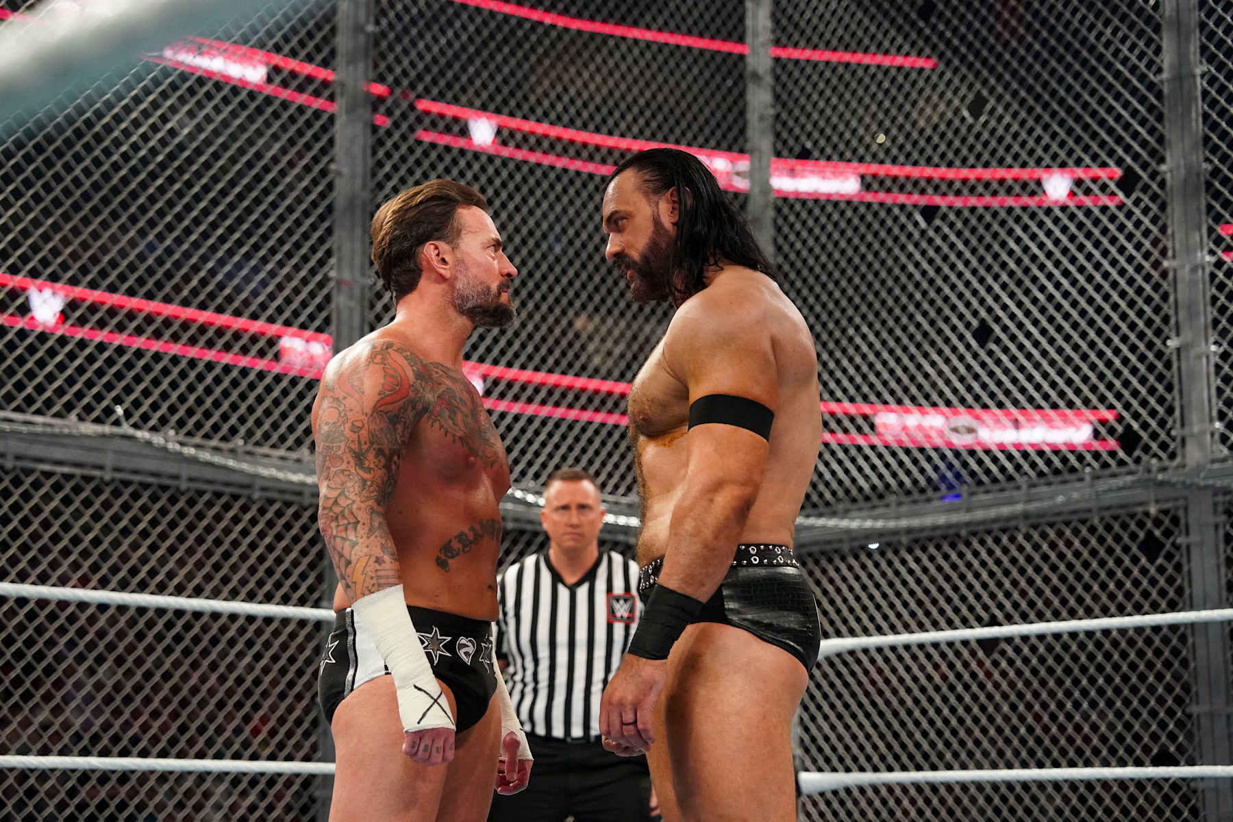 ATLANTA, GEORGIA - OCTOBER 5: CM Punk and Drew McIntyre face off during Bad Blood at State Farm Arena on October 5, 2024 in Atlanta, Georgia. (Photo by WWE/Getty Images)