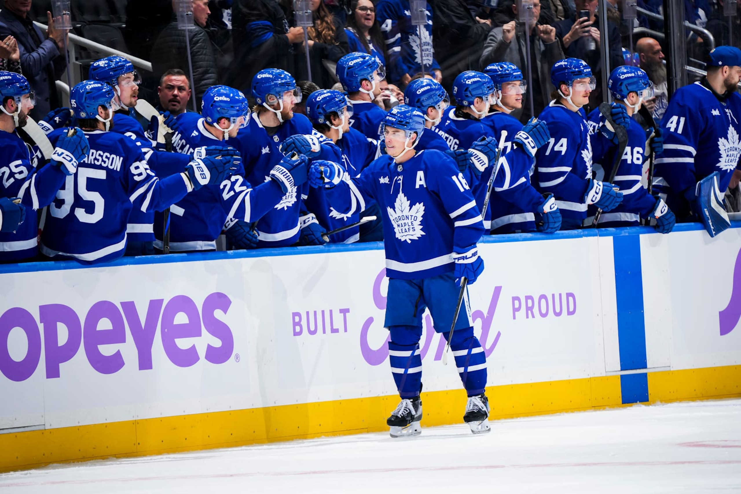 TORONTO, ON - NOVEMBER 24: Mitch Marner #16 of the Toronto Maple Leafs celebrates scoring a goal with his teammates during the second period against the Utah Hockey Club at the Scotiabank Arena on November 24, 2024 in Toronto, Ontario, Canada. (Photo by Mark Blinch/NHLI via Getty Images)