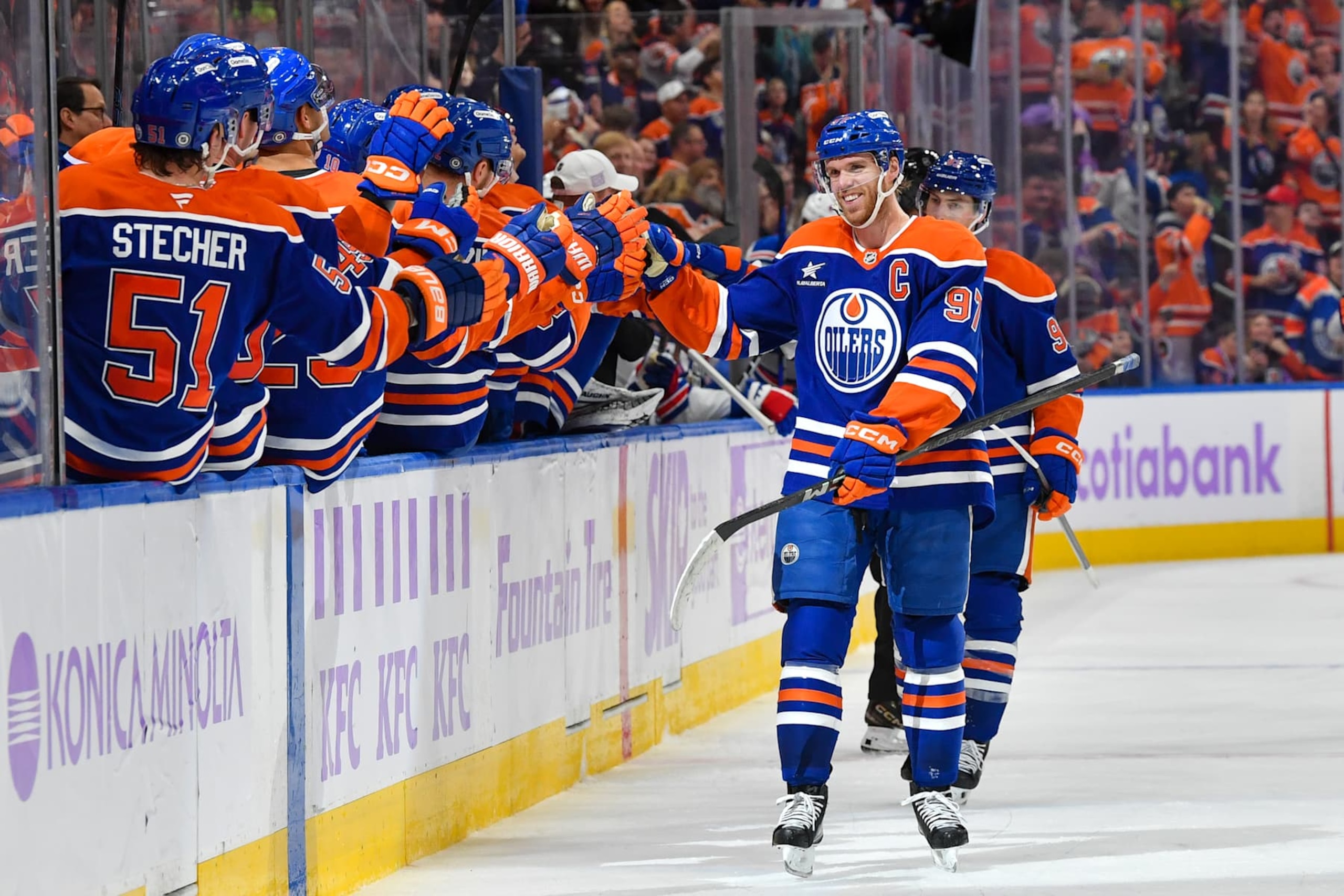 EDMONTON, CANADA - NOVEMBER 23: Connor McDavid #97 of the Edmonton Oilers celebrates his third period goal against the New York Rangers with his teammates at the bench at Rogers Place on November 23, 2024, in Edmonton, Alberta, Canada. (Photo by Andy Devlin/NHLI via Getty Images)