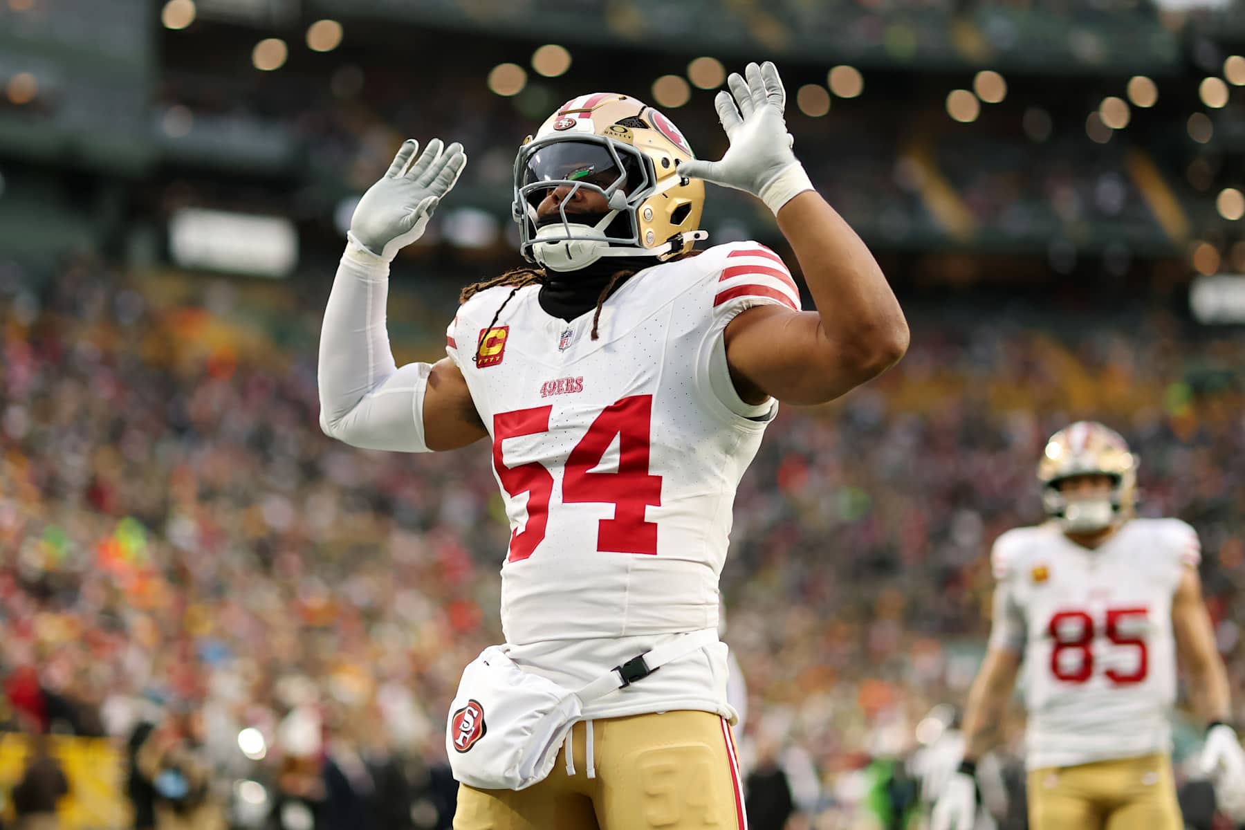 GREEN BAY, WISCONSIN - NOVEMBER 24: Fred Warner #54 of the San Francisco 49ers interacts with the crowd before the game against the Green Bay Packers at Lambeau Field on November 24, 2024 in Green Bay, Wisconsin. (Photo by Stacy Revere/Getty Images)
