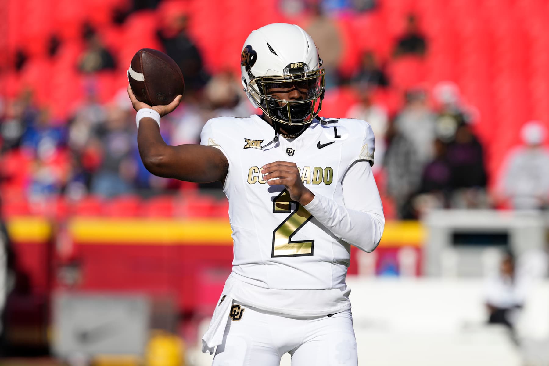 KANSAS CITY, MISSOURI - NOVEMBER 23:  Quarterback Shedeur Sanders #2 of the Colorado Buffaloes warms up prior to a game against the Kansas Jayhawks at Arrowhead Stadium on November 23, 2024 in Kansas City, Missouri.  (Photo by Ed Zurga/Getty Images)