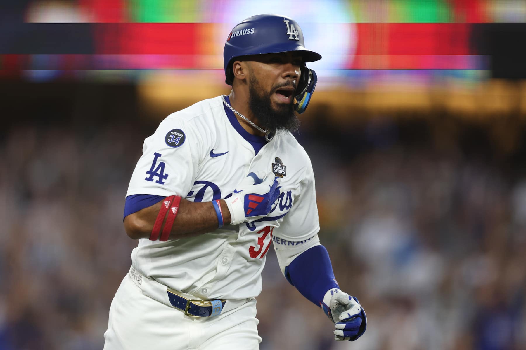 LOS ANGELES, CALIFORNIA - OCTOBER 26: Teoscar Hernández #37 of the Los Angeles Dodgers reacts to hitting a home run in the third inning against the New York Yankees during Game Two of the 2024 World Series at Dodger Stadium on October 26, 2024 in Los Angeles, California. (Photo by Harry How/Getty Images)