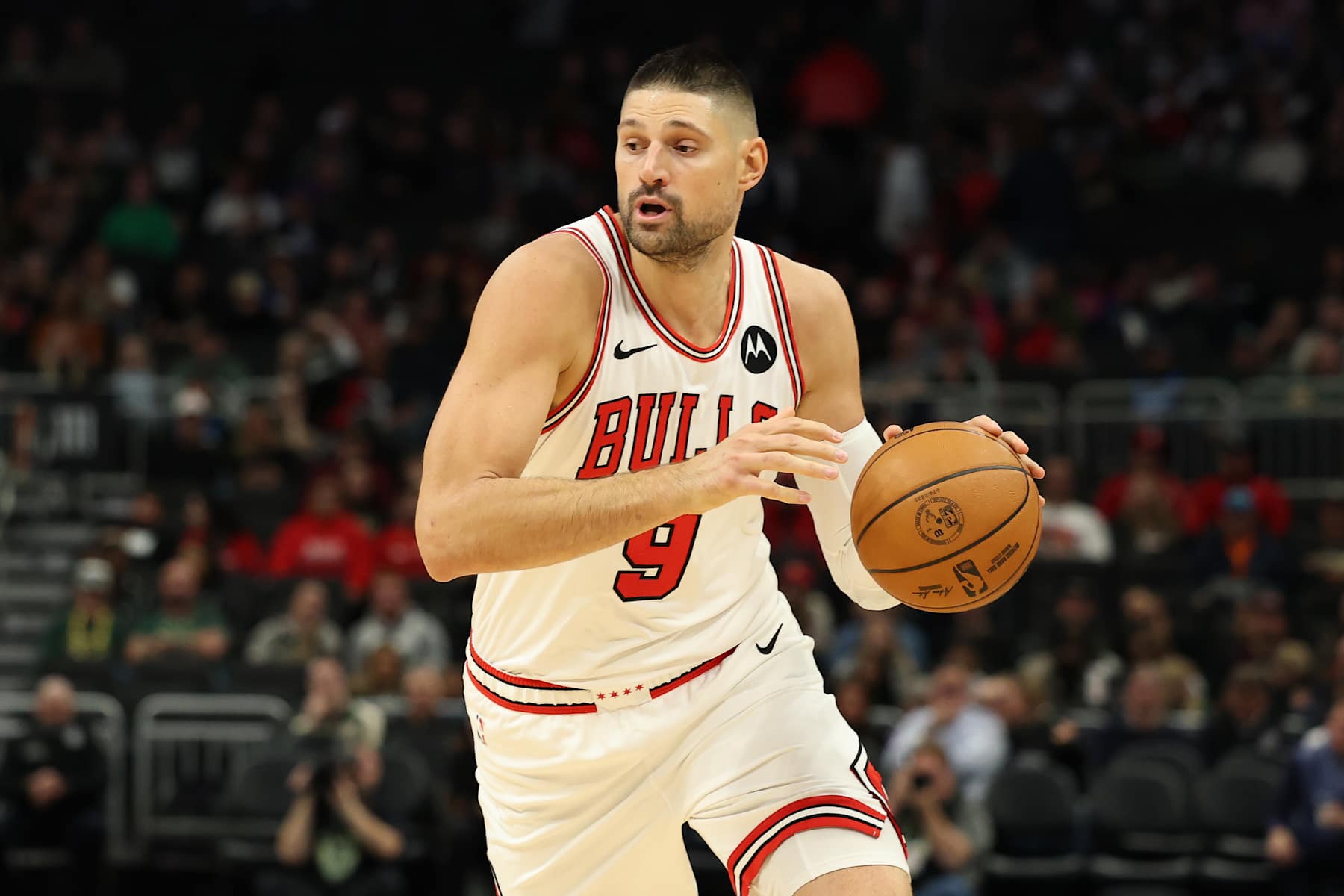 MILWAUKEE, WISCONSIN - NOVEMBER 20: Nikola Vucevic #9 of the Chicago Bulls handles the ball during a game against the Milwaukee Bucks at Fiserv Forum on November 20, 2024 in Milwaukee, Wisconsin. NOTE TO USER: User expressly acknowledges and agrees that, by downloading and or using this photograph, User is consenting to the terms and conditions of the Getty Images License Agreement. (Photo by Stacy Revere/Getty Images)