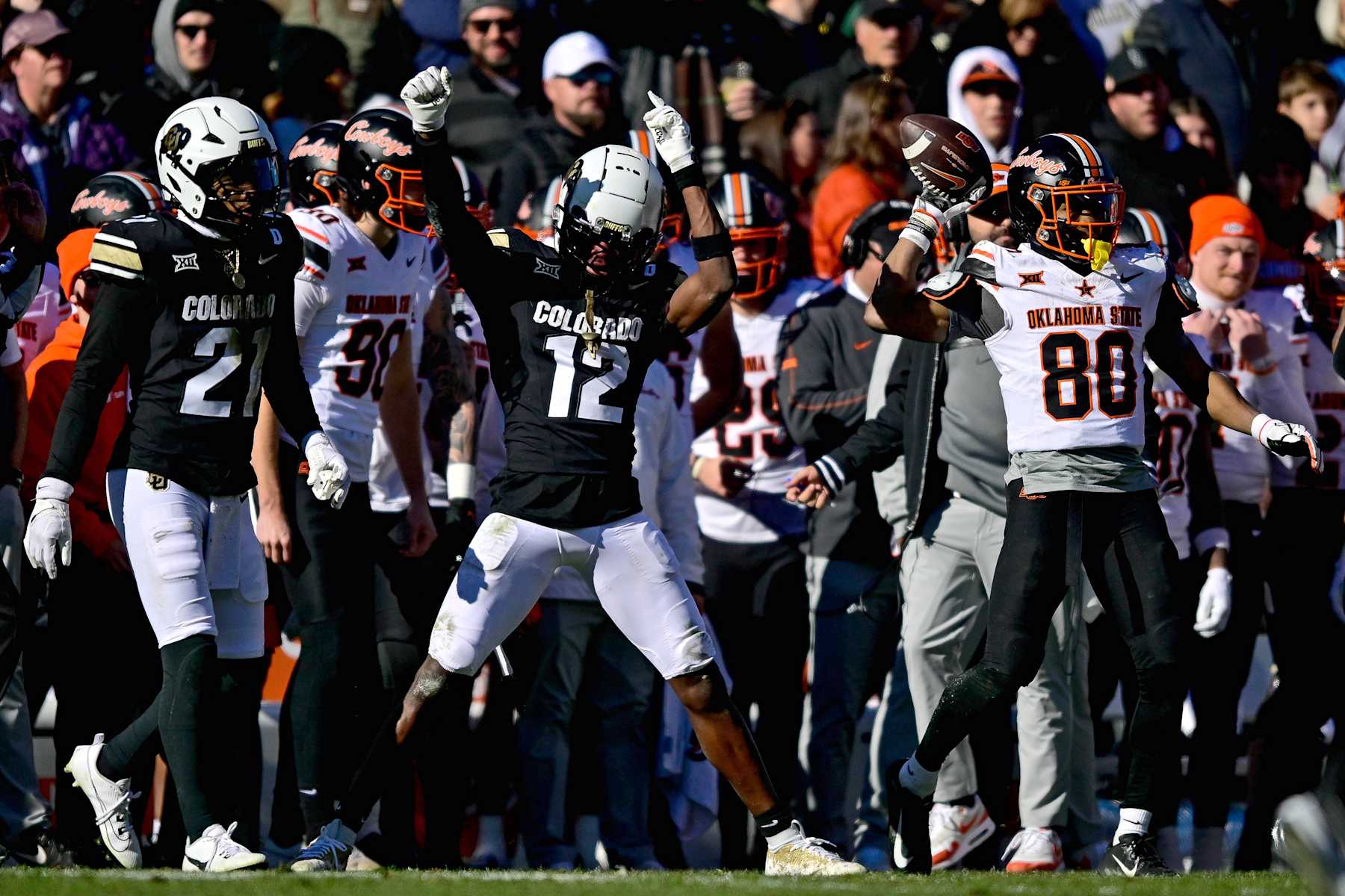BOULDER, CO - NOVEMBER 29:  Travis Hunter #12 of the Colorado Buffaloes celebrates after defending a pass against the Oklahoma State Cowboys in the second quarter at Folsom Field on November 29, 2024 in Boulder, Colorado. (Photo by Dustin Bradford/Getty Images)