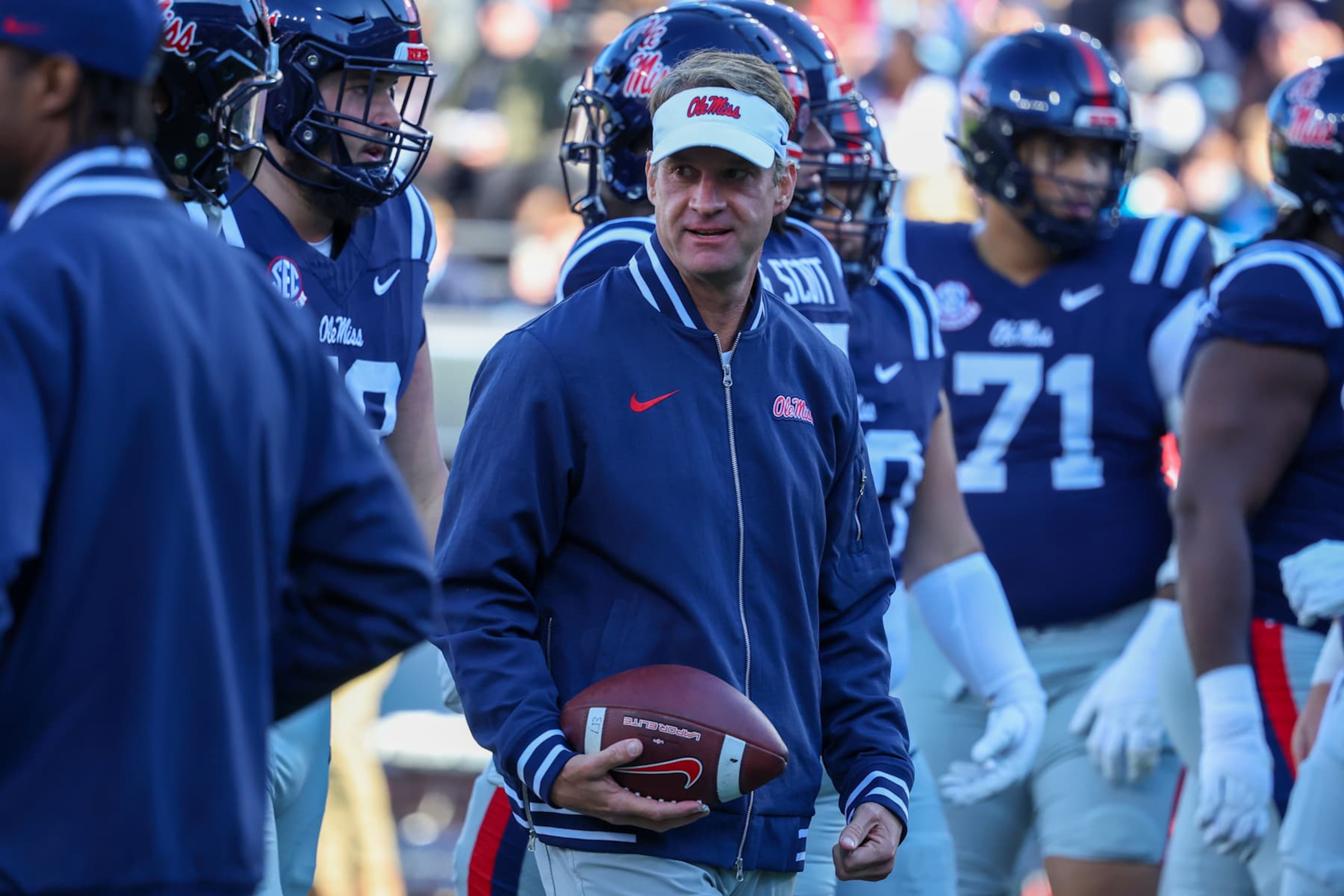 OXFORD, MISSISSIPPI - NOVEMBER 29: Lane Kiffin head coach of the Mississippi Rebels looks on before the game against the Mississippi State Bulldogs at Vaught-Hemingway Stadium on November 29, 2024 in Oxford, Mississippi. (Photo by Wes Hale/Getty Images) OXFORD, MISSISSIPPI - NOVEMBER 29: Lane Kiffin head coach of the Mississippi Rebels looks on before the game against the Mississippi State Bulldogs at Vaught-Hemingway Stadium on November 29, 2024 in Oxford, Mississippi. (Photo by Wes Hale/Getty Images)