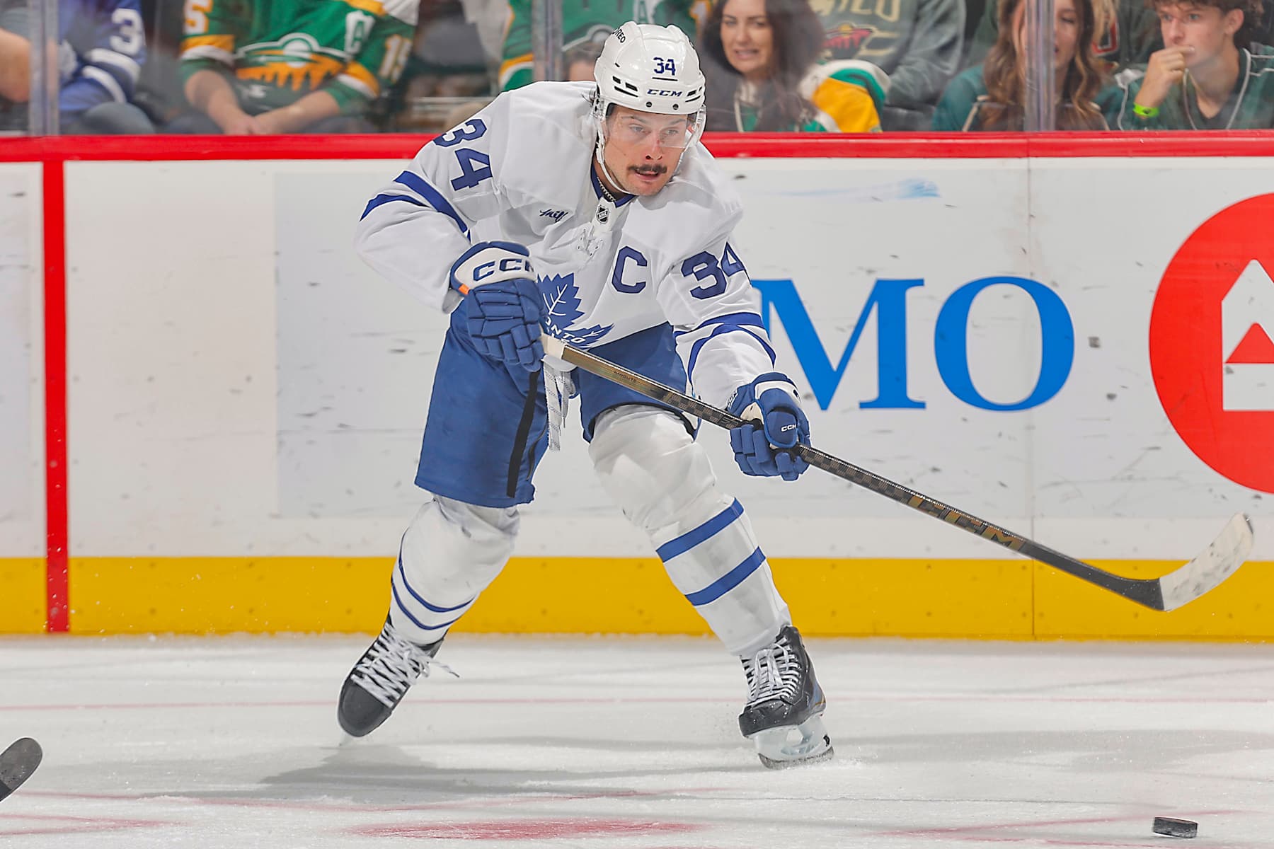 SAINT PAUL, MN - NOVEMBER 3: Auston Matthews #34 of the Toronto Maple Leafs passes the puck against the Minnesota Wild during the game at the Xcel Energy Center on November 3, 2024 in Saint Paul, Minnesota. (Photo by Bruce Kluckhohn/NHLI via Getty Images)