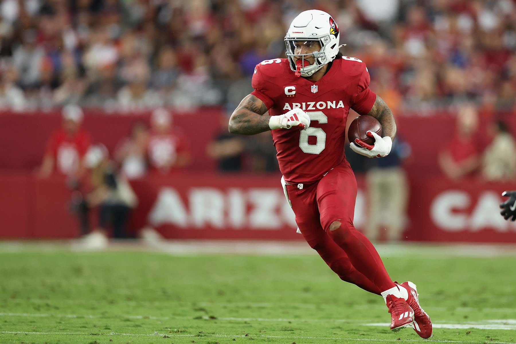 GLENDALE, ARIZONA - NOVEMBER 03: James Conner #6 of the Arizona Cardinals rushes the football against the Chicago Bears during the NFL game at State Farm Stadium on November 03, 2024 in Glendale, Arizona. The Cardinals defeated the Bears 29-9.  (Photo by Christian Petersen/Getty Images)