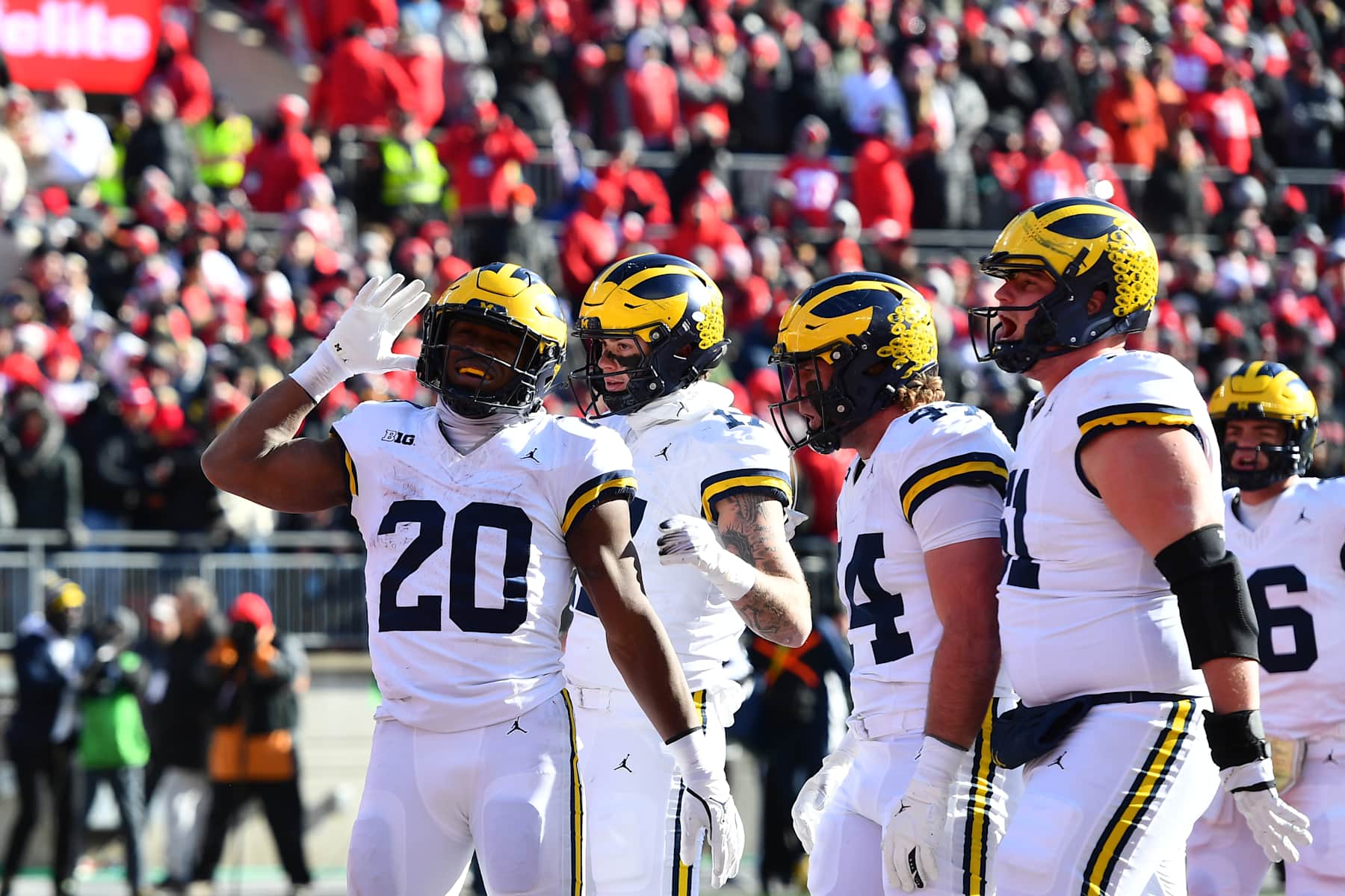 COLUMBUS, OHIO - NOVEMBER 30: Kalel Mullings #20 of the Michigan Wolverines reacts after scoring a touchdown during the second quarter of a game against the Ohio State Buckeyes at Ohio Stadium on November 30, 2024 in Columbus, Ohio. (Photo by Ben Jackson/Getty Images)