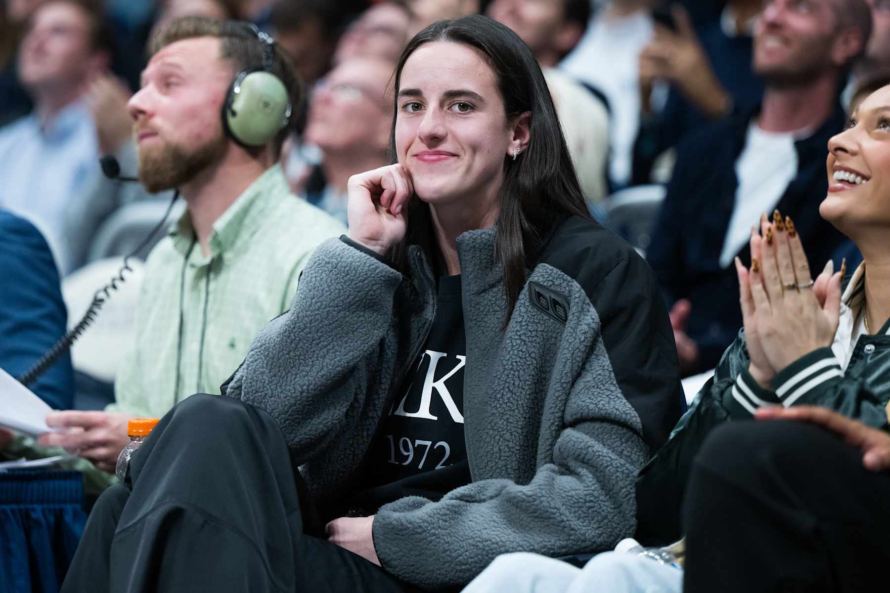 INDIANAPOLIS, IN - NOVEMBER 11: Caitlin Clark sits courtside during the men's college basketball game between the Butler Bulldogs and Western Michigan Broncos on November 11, 2024, at Hinkle Fieldhouse in Indianapolis, IN. (Photo by Zach Bolinger/Icon Sportswire via Getty Images)