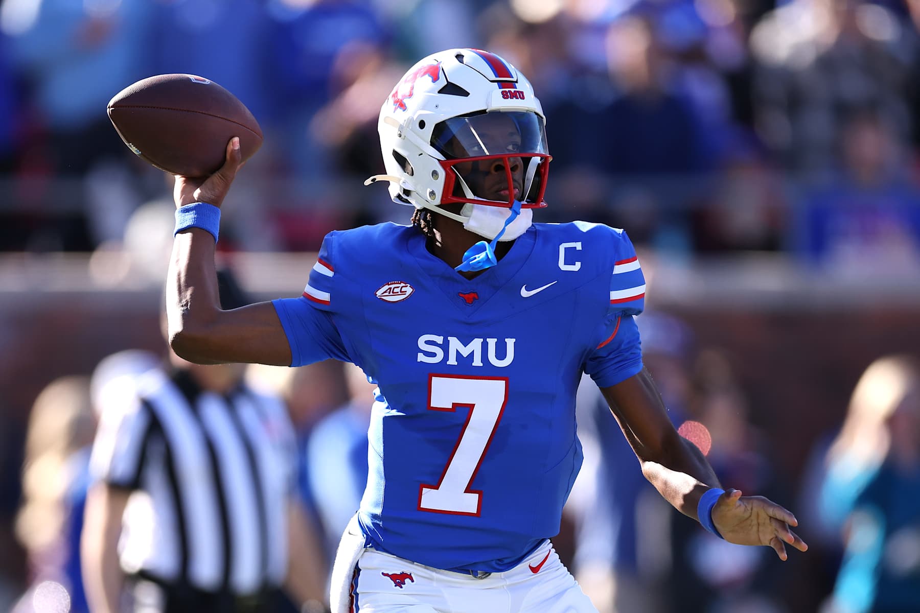DALLAS, TEXAS - NOVEMBER 30: Kevin Jennings #7 of the Southern Methodist Mustangs throws during the first half of the game against the California Golden Bears at Gerald J. Ford Stadium on November 30, 2024 in Dallas, Texas. (Photo by Sam Hodde/Getty Images)