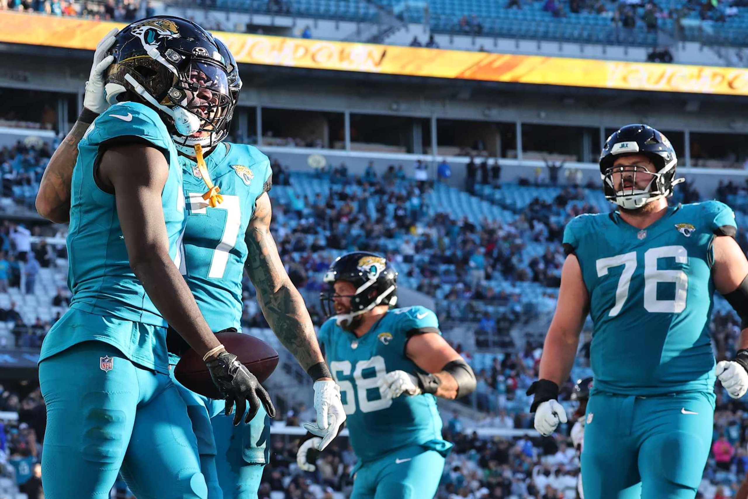 JACKSONVILLE, FLORIDA - DECEMBER 01: Brian Thomas Jr. #7 of the Jacksonville Jaguars celebrates a fourth quarter touchdown against the Houston Texans at EverBank Stadium on December 01, 2024 in Jacksonville, Florida. (Photo by Mike Carlson/Getty Images)
