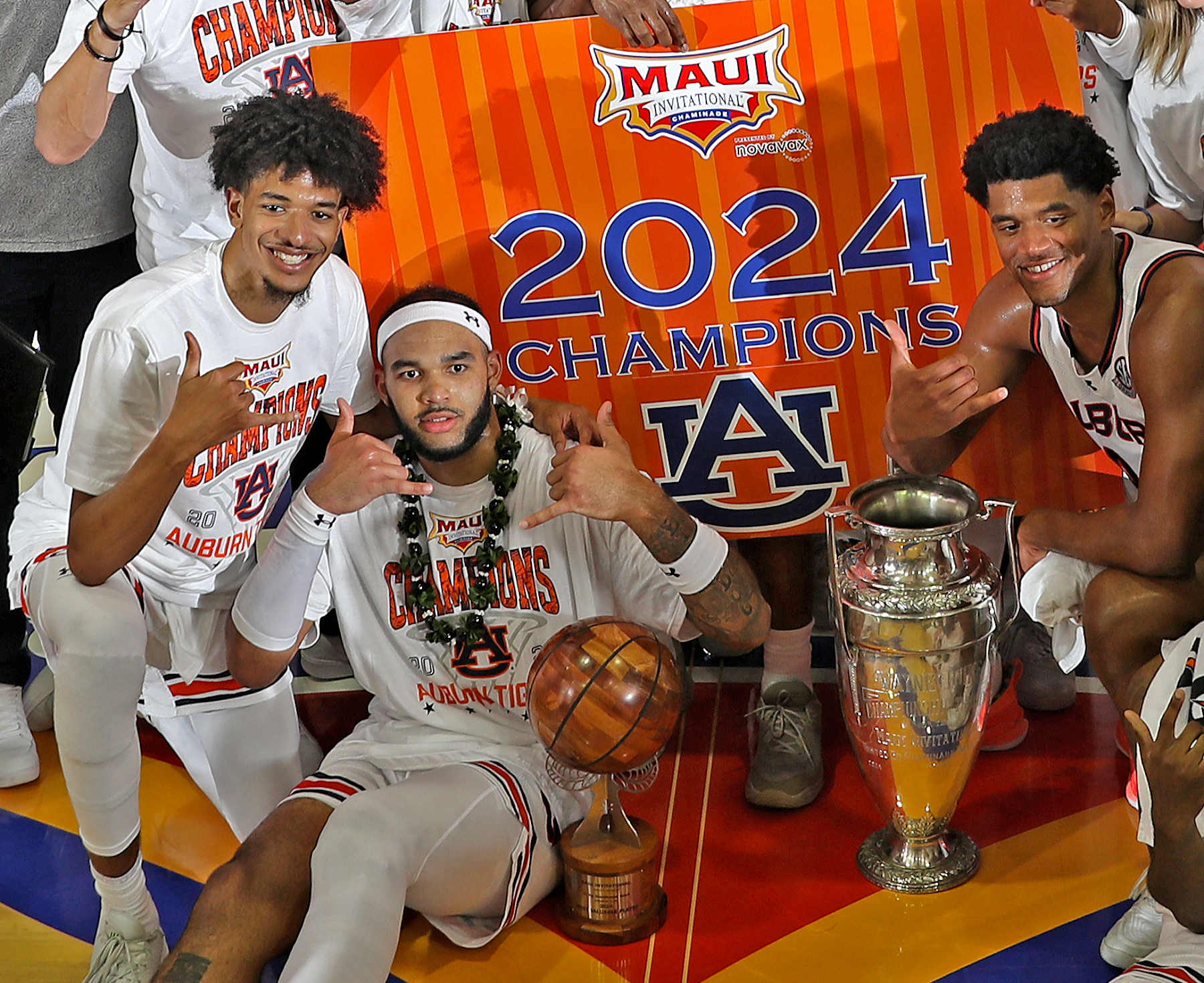 MAUI, HI - NOVEMBER 27: Auburn Tigers forward Johni Broome (4 ) poses with the MVP Trophy and the Wayne Duke Trophy after defeating the Memphis Tigers in the championship game of the Maui Invitational on November 27, 2024, at the Lahaina Civic Center in Maui, Hawaii. (Photo by Brian Spurlock/Icon Sportswire via Getty Images)
