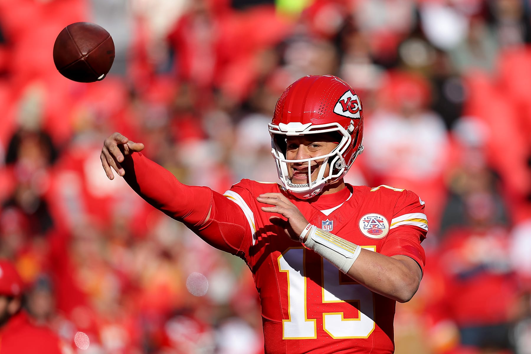 KANSAS CITY, MISSOURI - NOVEMBER 29: Patrick Mahomes #15 of the Kansas City Chiefs warms up prior to the game against the Las Vegas Raiders at GEHA Field at Arrowhead Stadium on November 29, 2024 in Kansas City, Missouri. (Photo by David Eulitt/Getty Images)