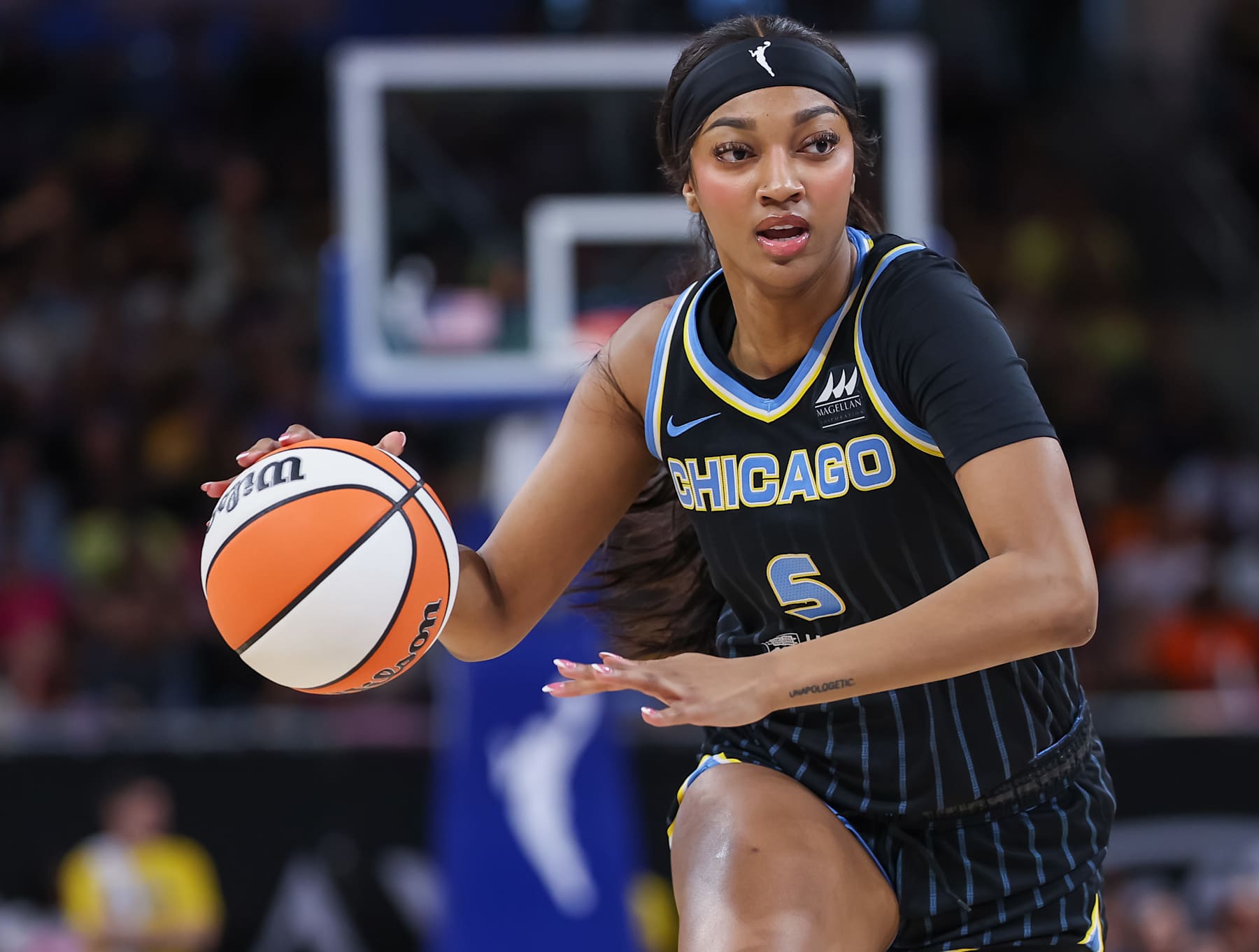 CHICAGO, ILLINOIS - AUGUST 30: Angel Reese #5 of the Chicago Sky brings the ball up court during the game against the Indiana Fever at Wintrust Arena on August 30, 2024 in Chicago, Illinois. NOTE TO USER: User expressly acknowledges and agrees that, by downloading and or using this photograph, User is consenting to the terms and conditions of the Getty Images License Agreement. (Photo by Michael Hickey/Getty Images)